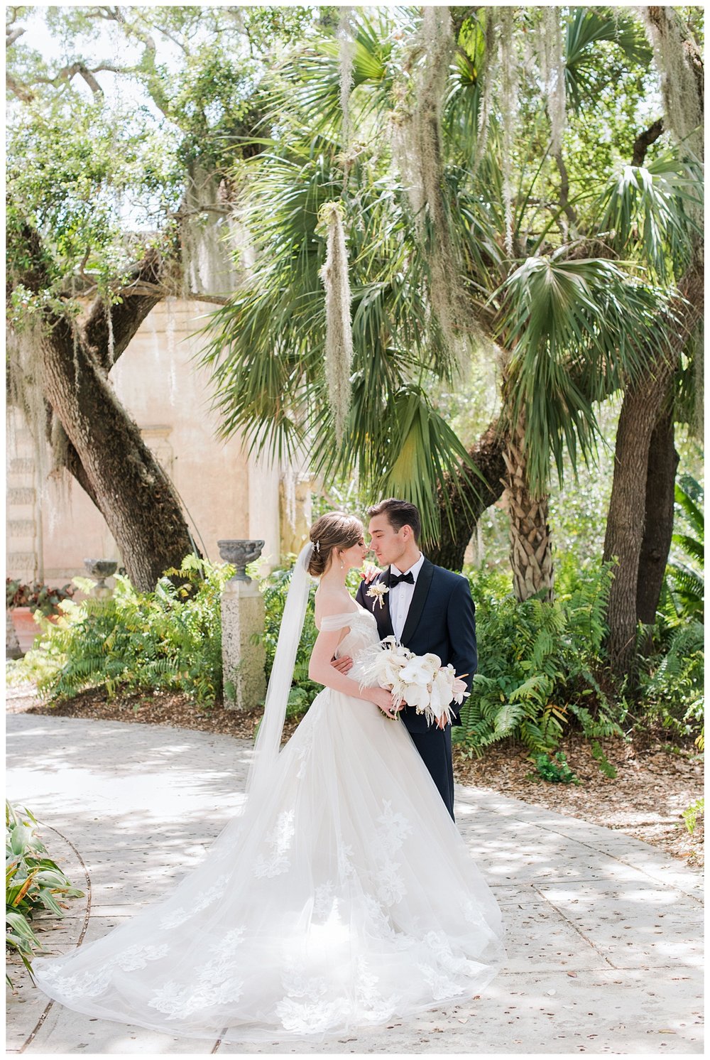 bride and groom nuzzling outdoor portrait Miami