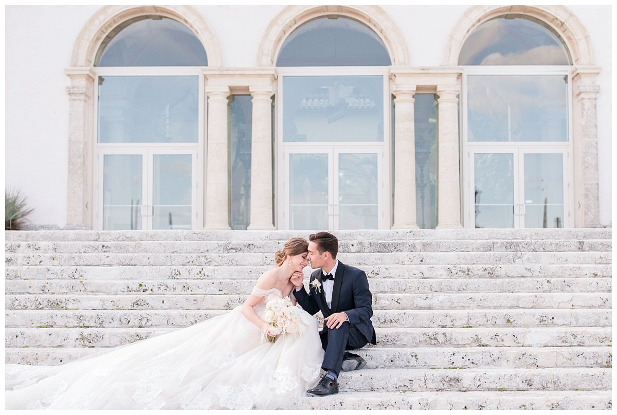 bride and groom portrait outside on steps at Miami Vizcaya Museum and Gardens