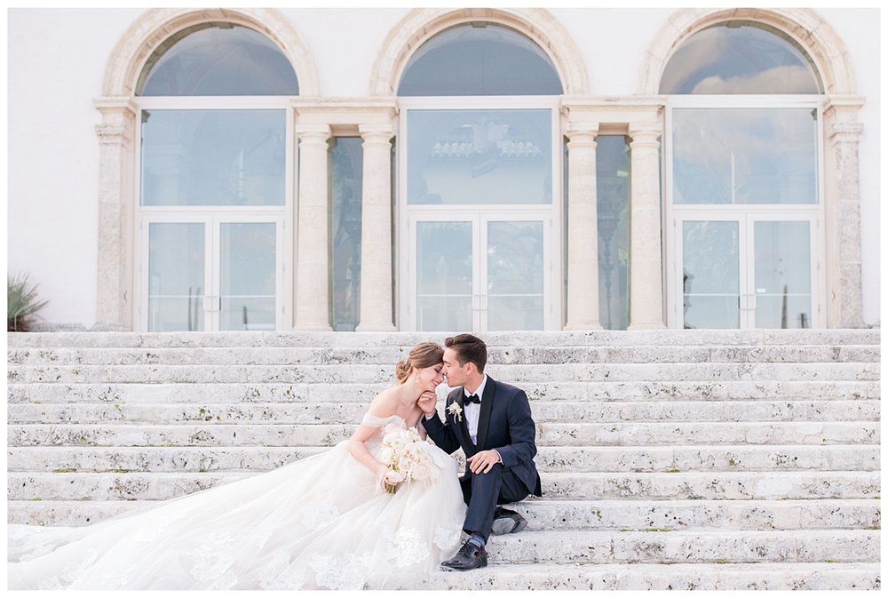 bride and groom portrait outside on steps at Miami Vizcaya Museum and Gardens