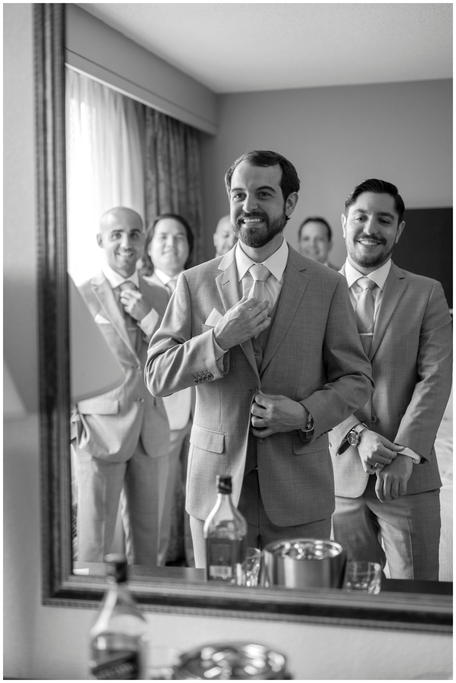 groom and groomsmen getting ready