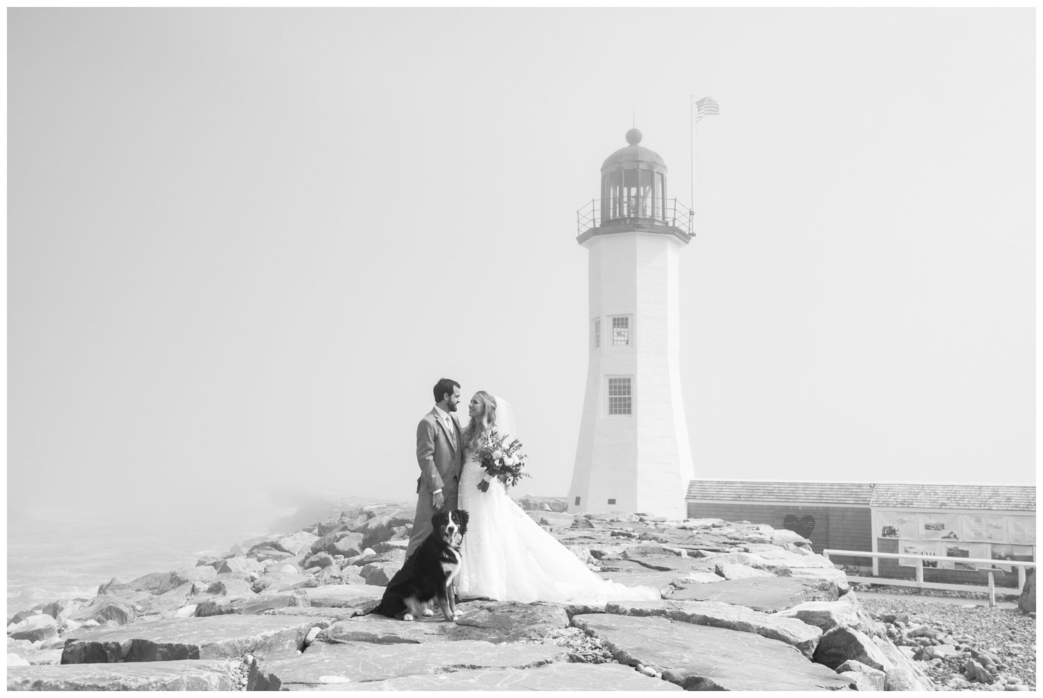 black and white image of bride and groom standing in front of the Scituate lighthouse in New England. Massachusetts