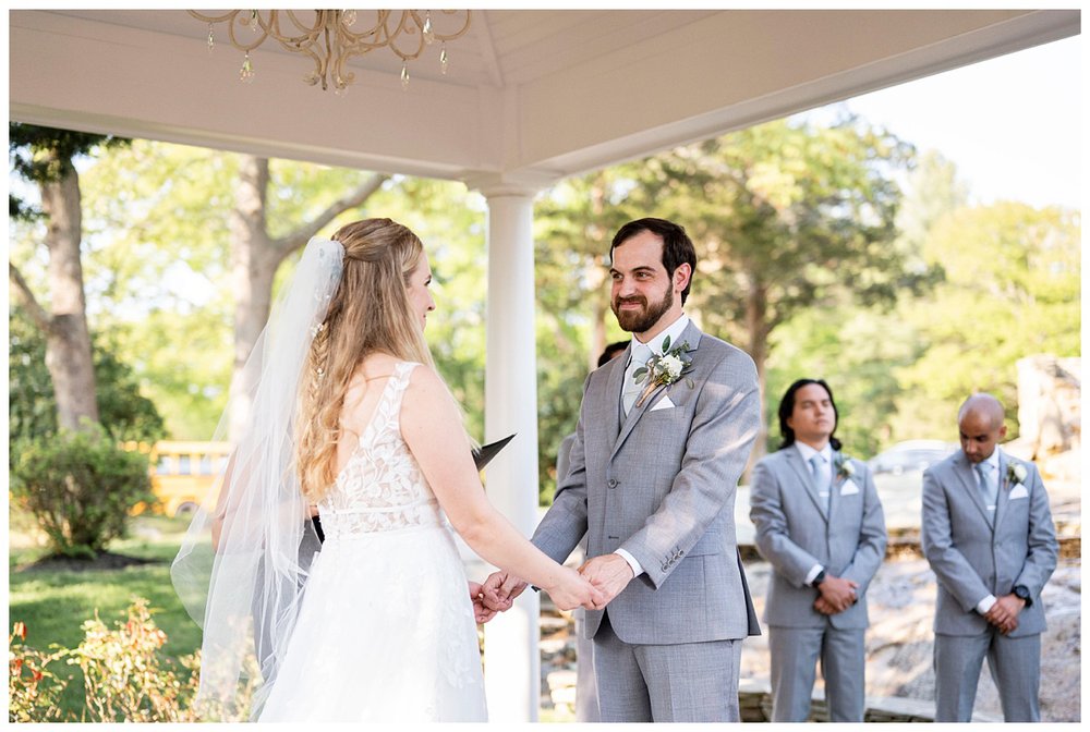 bride and groom vow exchange in Massachusetts New England wedding photographer