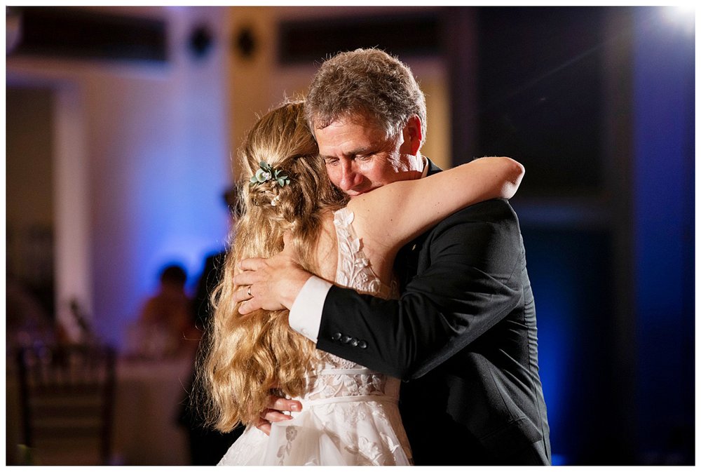 father daughter dance and hugging New England wedding reception