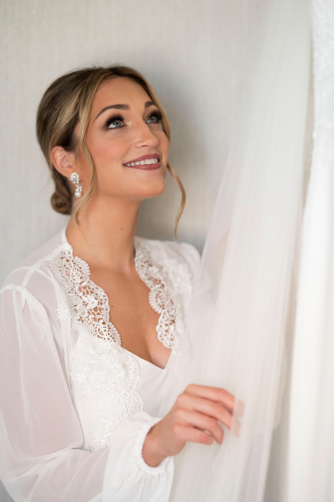 bride posing with wedding dress for bridal portraits