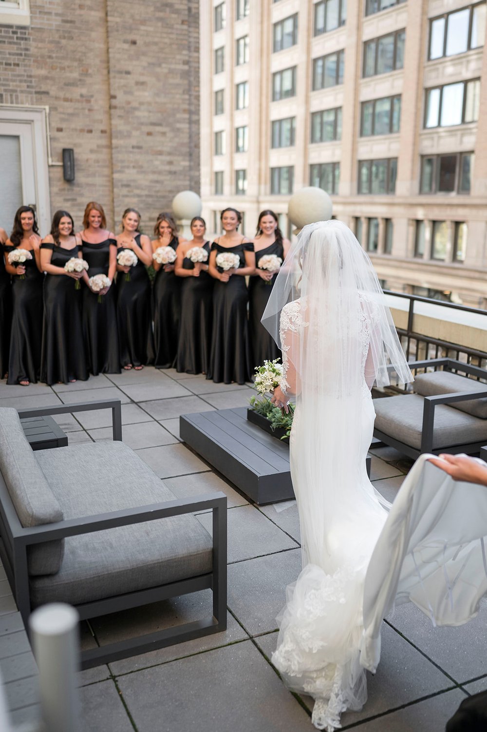 bridesmaids wedding party photos during bride first look