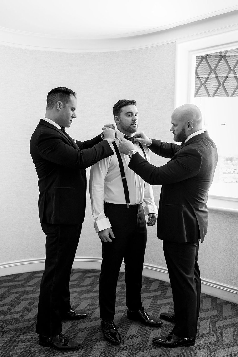 groomsmen getting ready with groom during boston wedding day