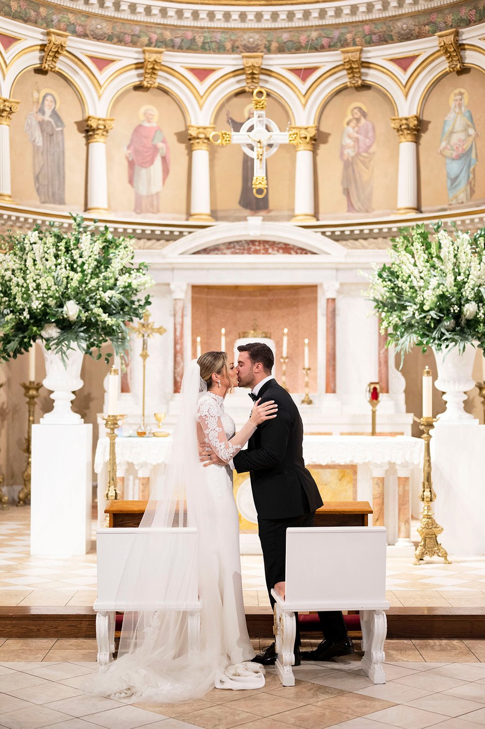 bride and groom kissing at Saint Leonard Church