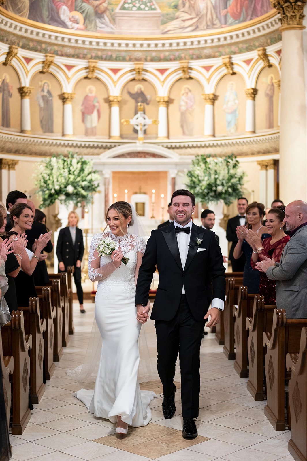 bride and groom walking down aisle at Saint Leonard Church