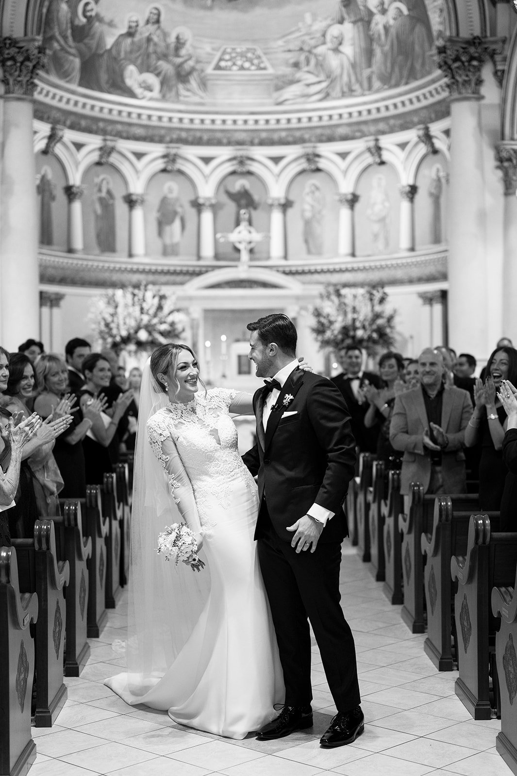 bride and groom walking down aisle at Saint Leonard Church
