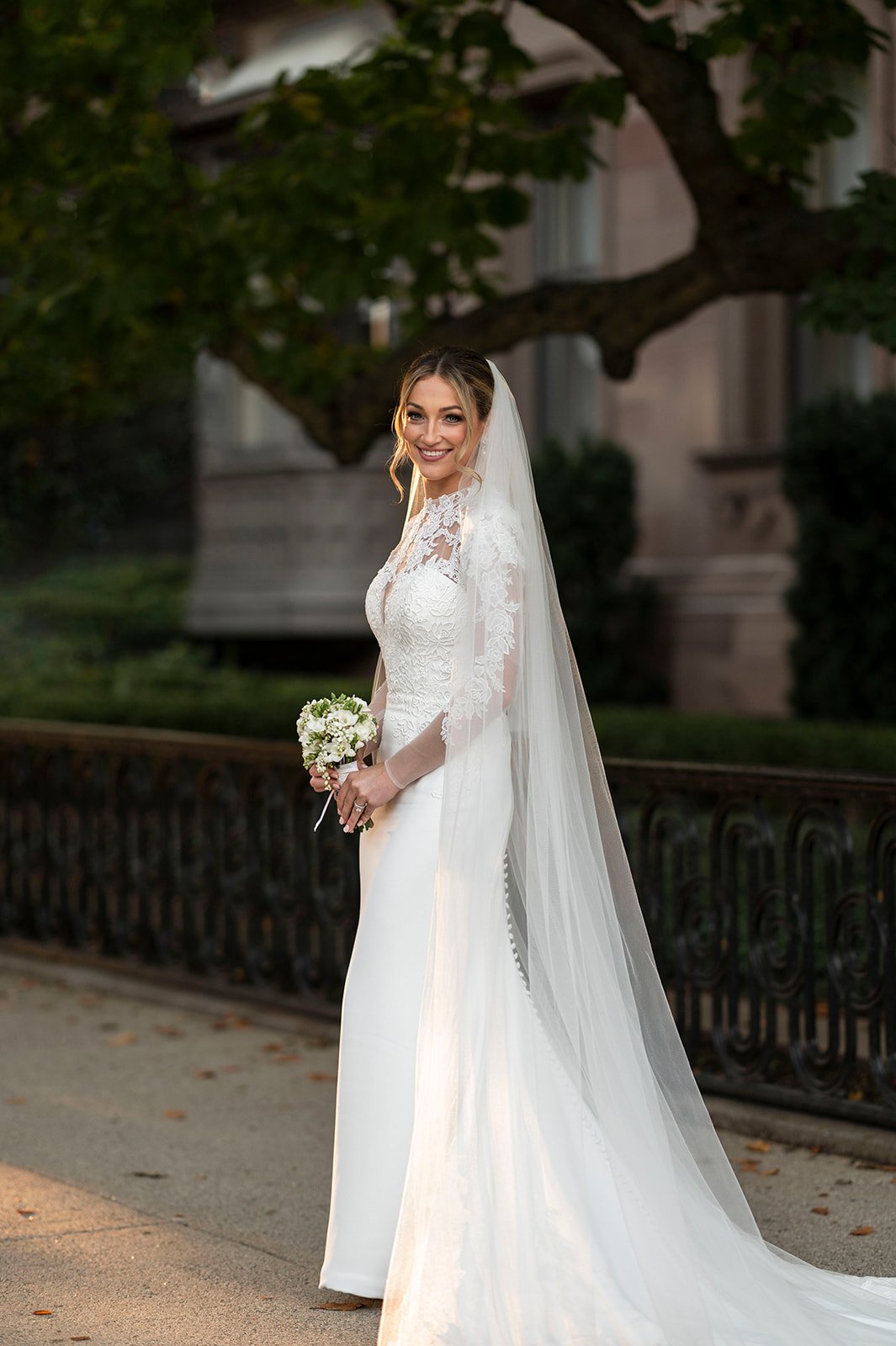 bride posing during wedding photos in Boston