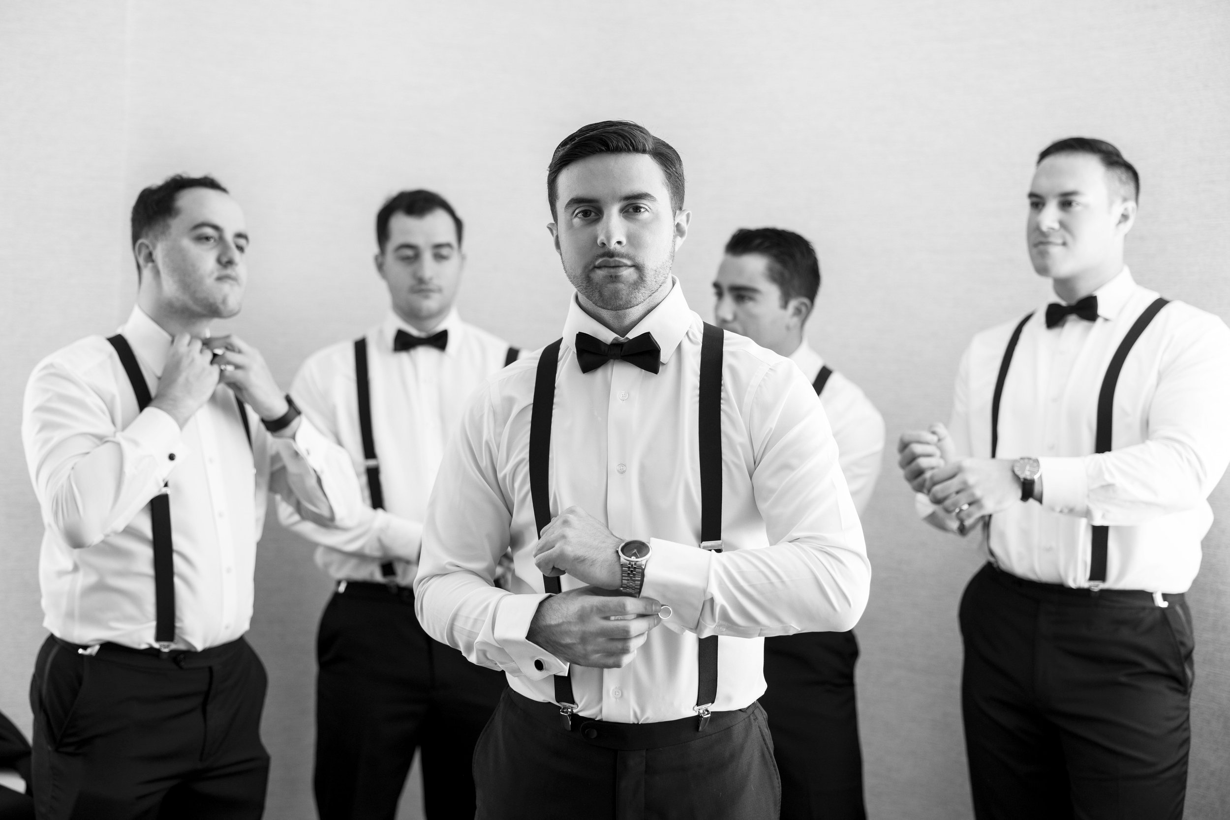 groomsmen getting ready with groom during boston wedding day