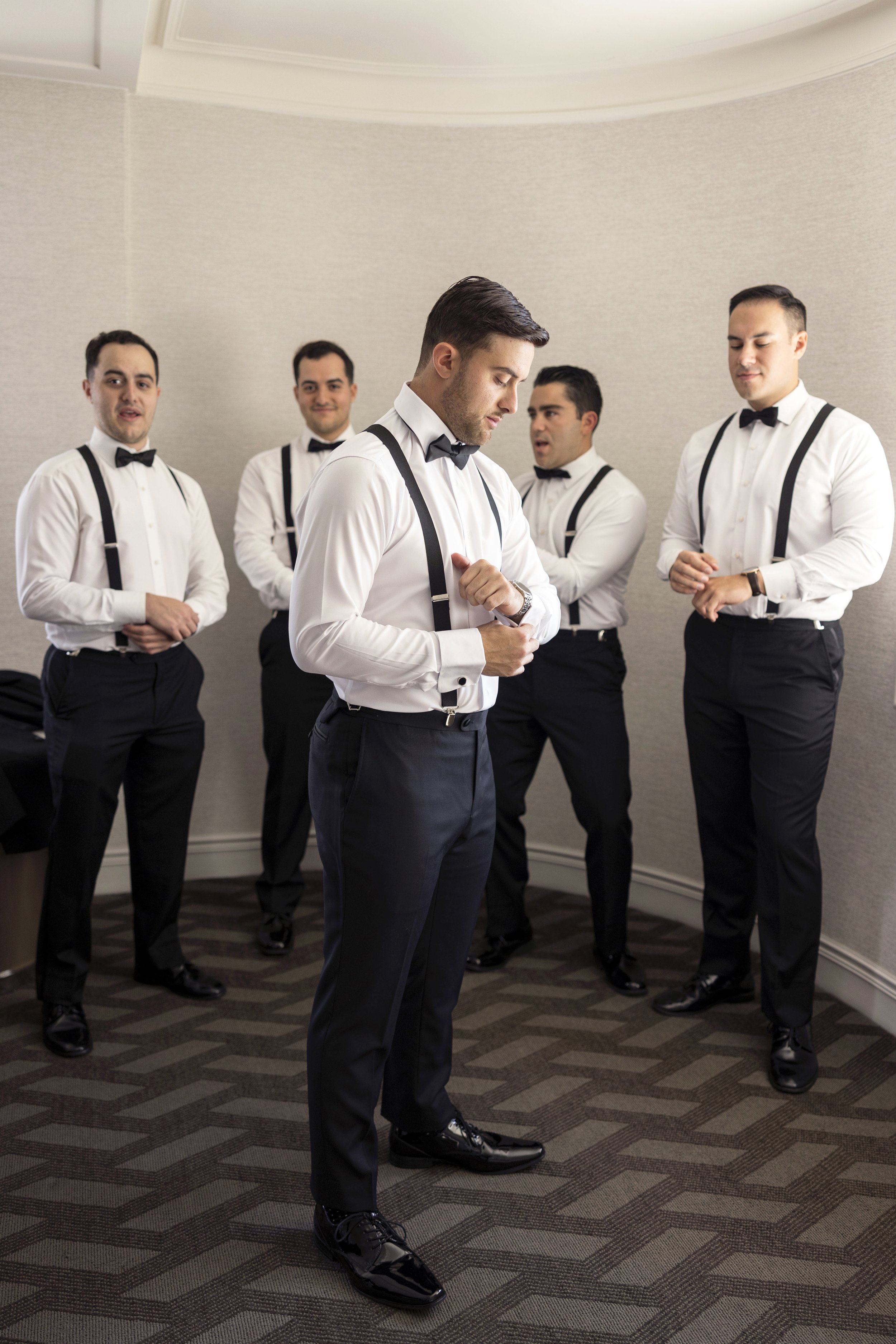 groomsmen getting ready with groom during boston wedding day