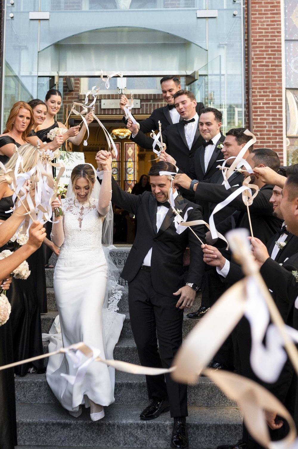 bridal party celebratory wedding photos in Boston