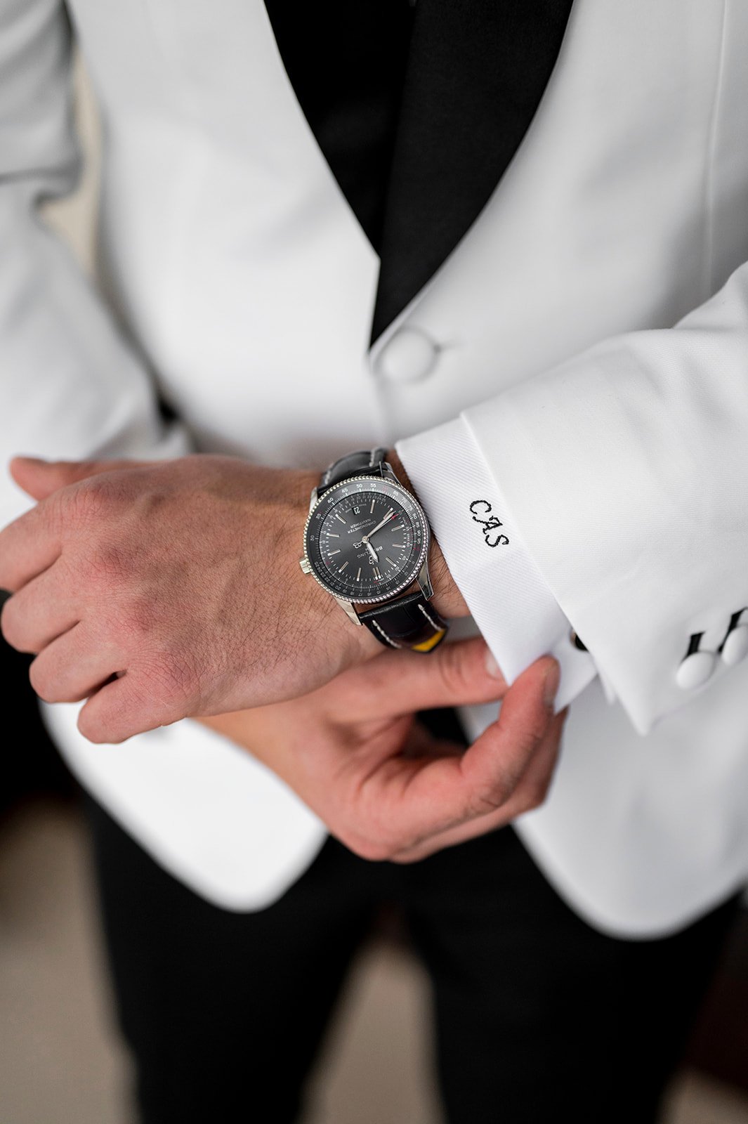  groom getting ready during newport wedding day 