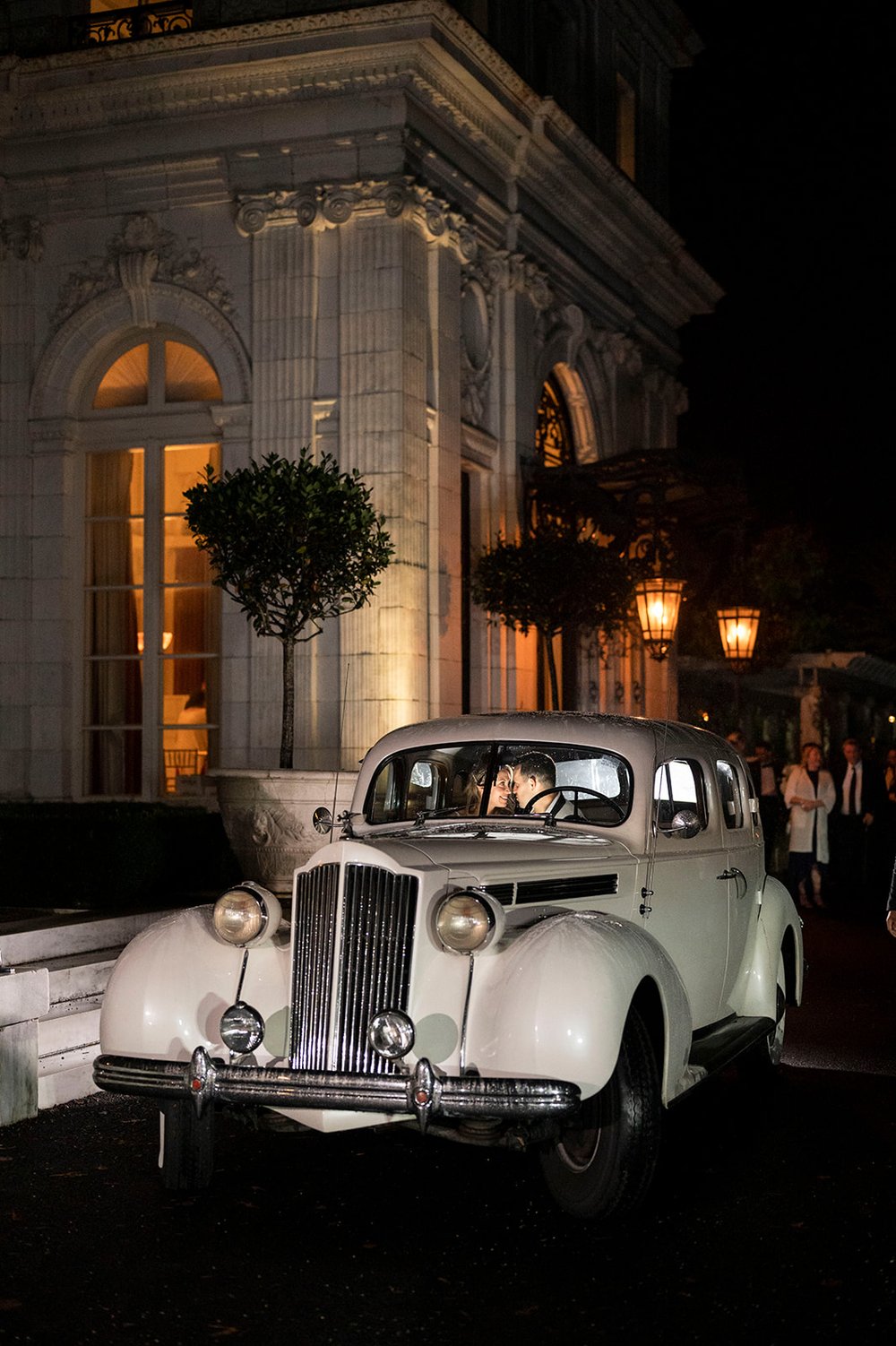  wedding exit photos with bride and groom and rolls royce 
