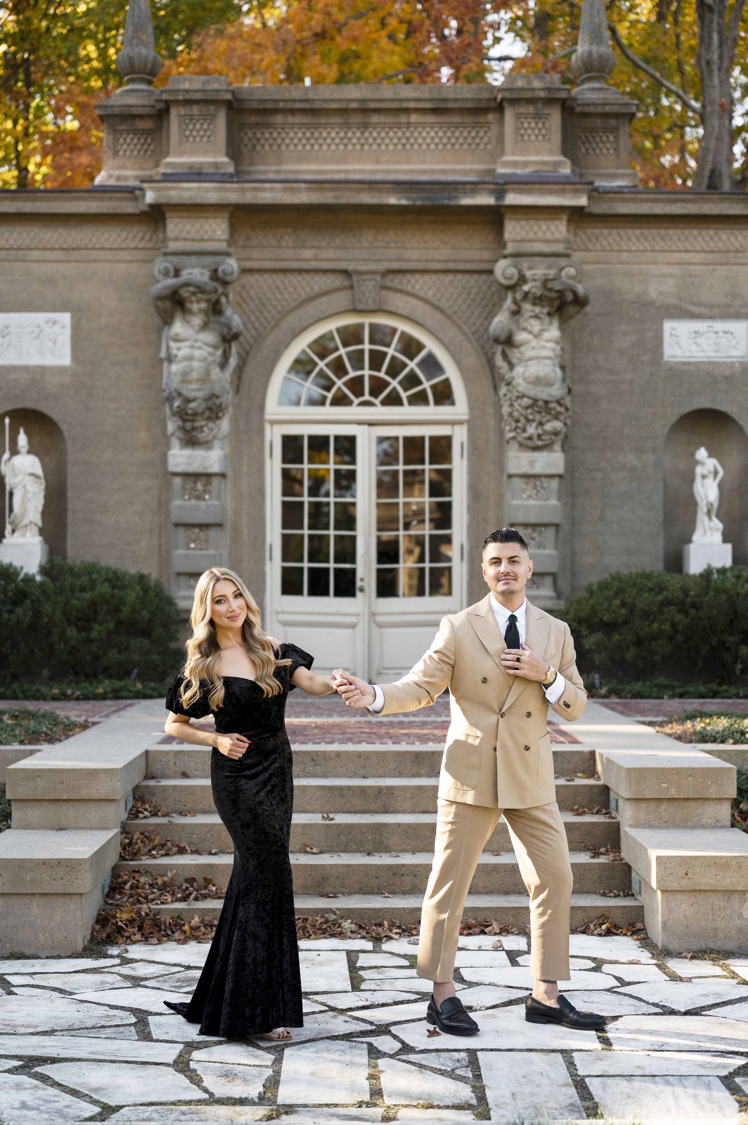 couple holding hands dancing