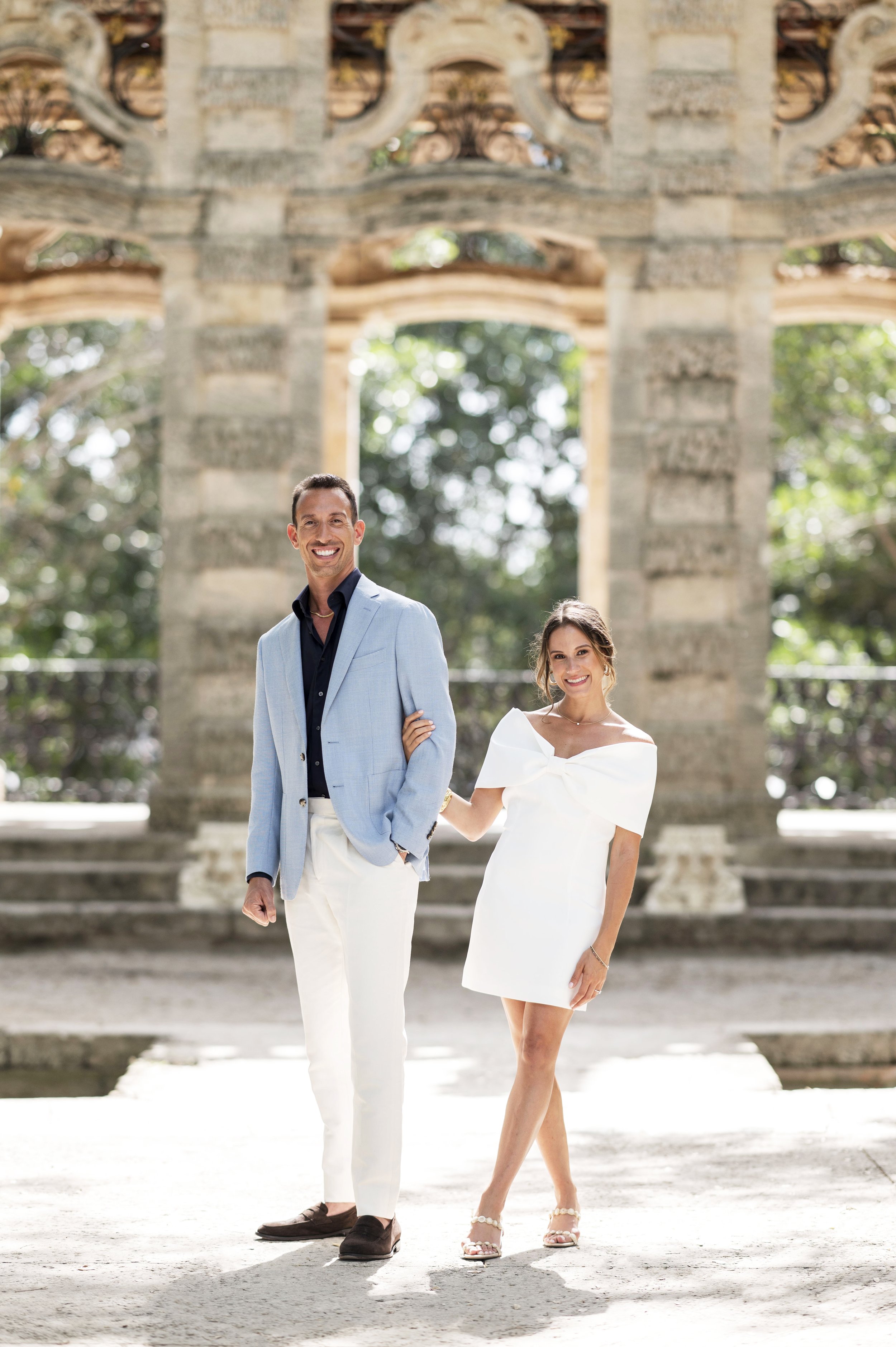 garden engagement photos with elegant and classy couple