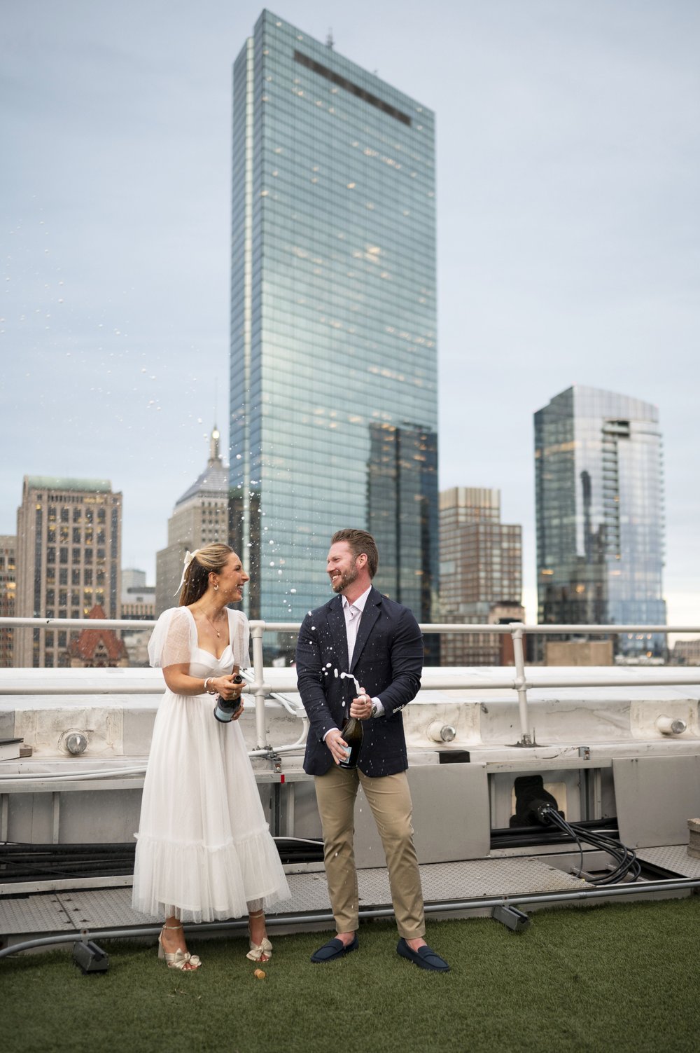 bride and groom in the lenox hotel rooftop