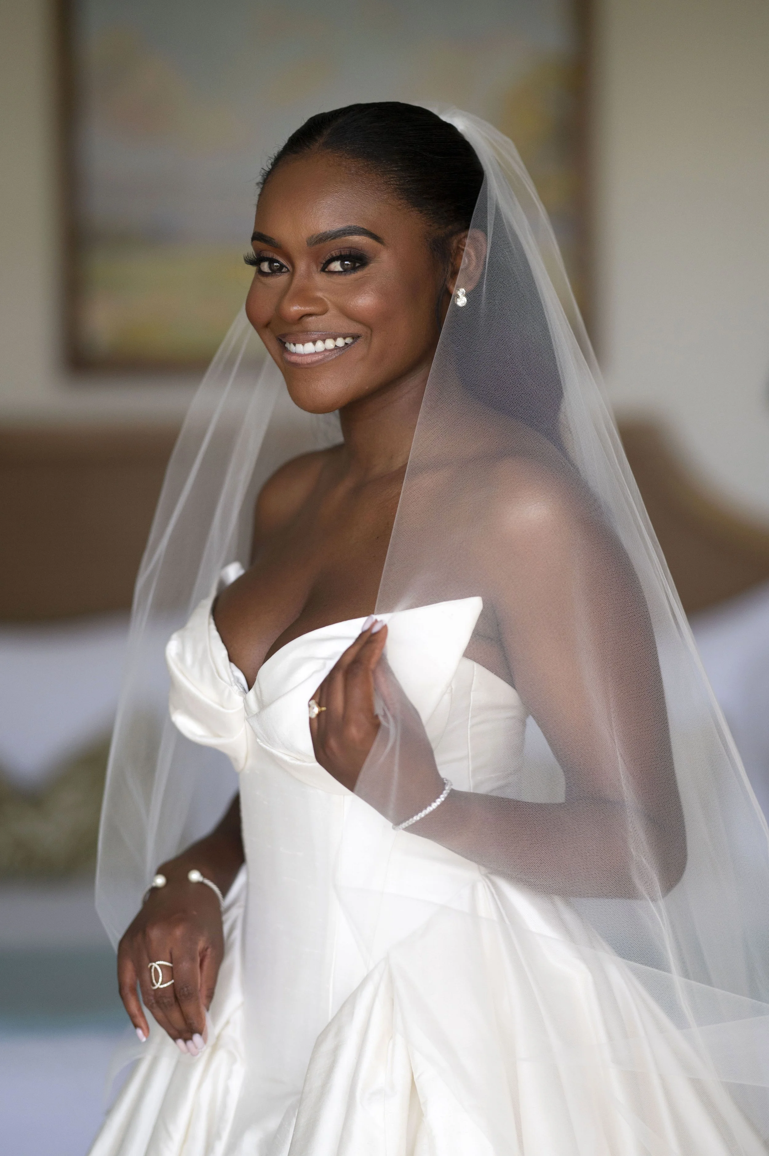 bride posing holding her veil