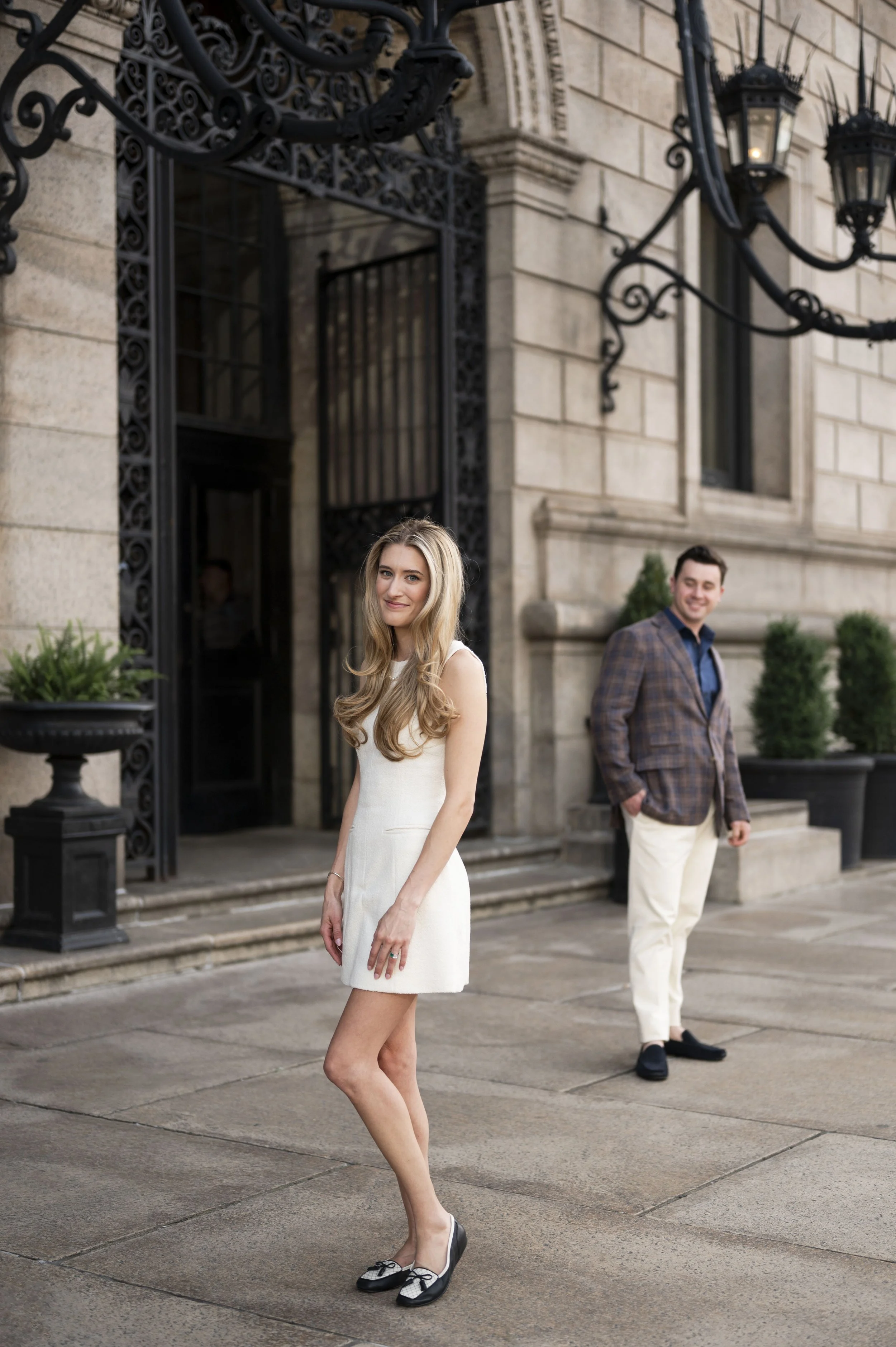 Cathryn and Brendan in fron of the Boston public library during their engagement session