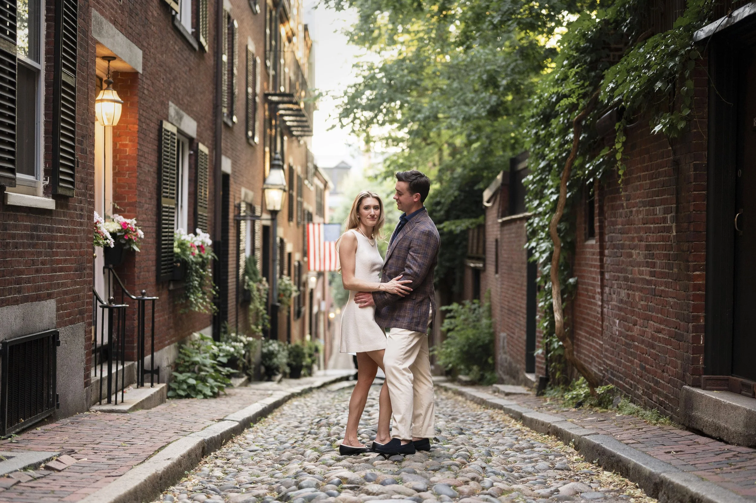Cathryn and Brendan posing in front of Acorn Street