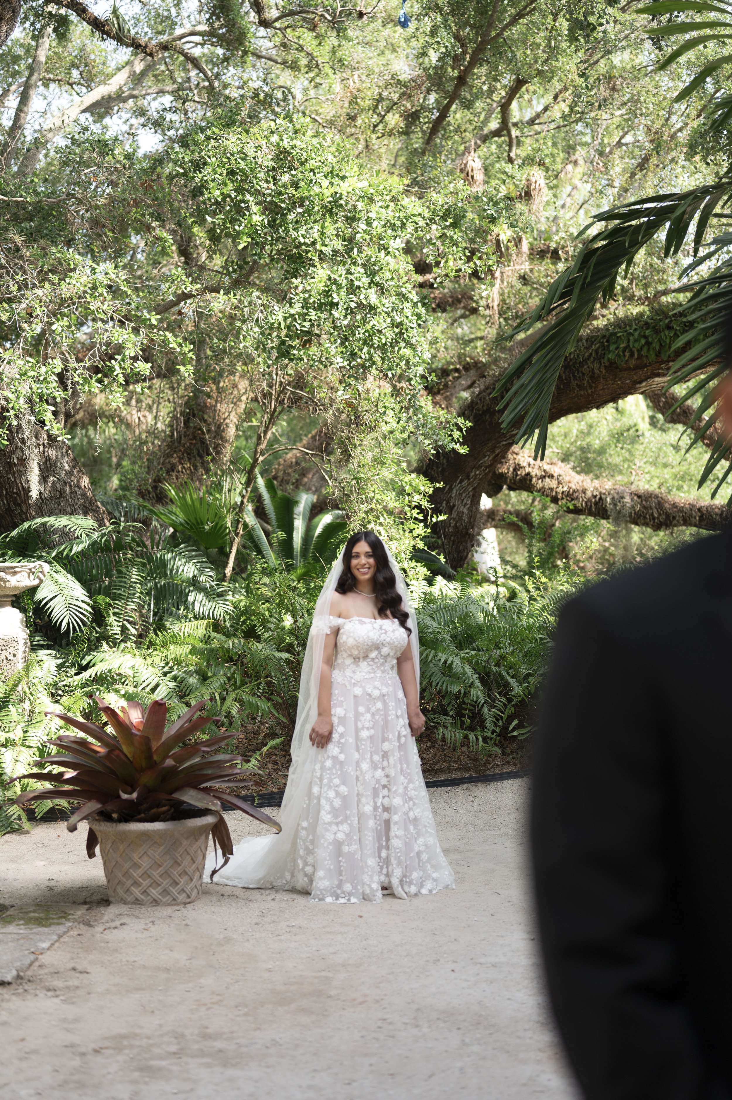 Bride standing waiting for the firs look by the mount at the Vizcaya museum