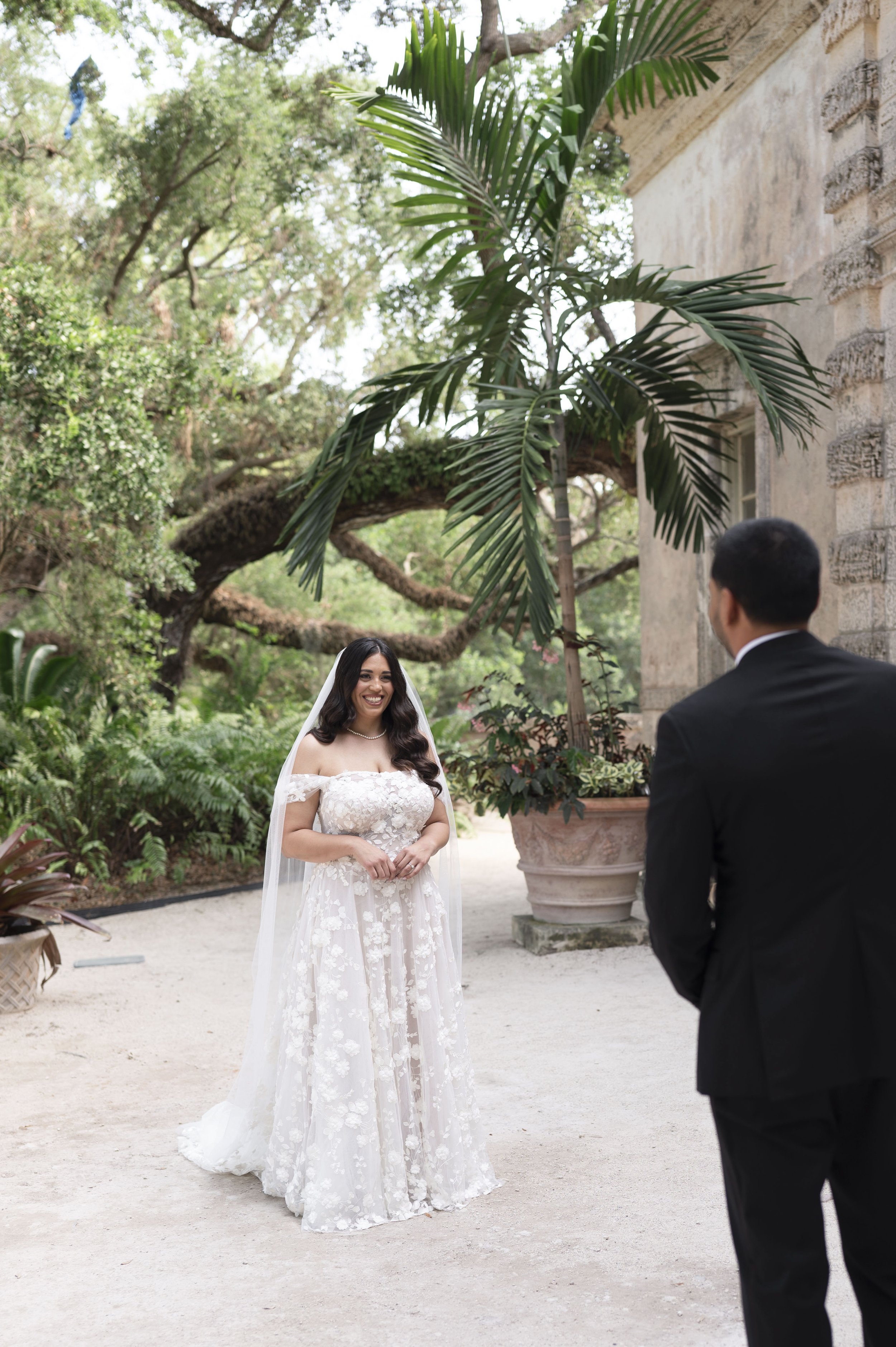 bride and groom first look at the Vizcaya museum on their wedding day