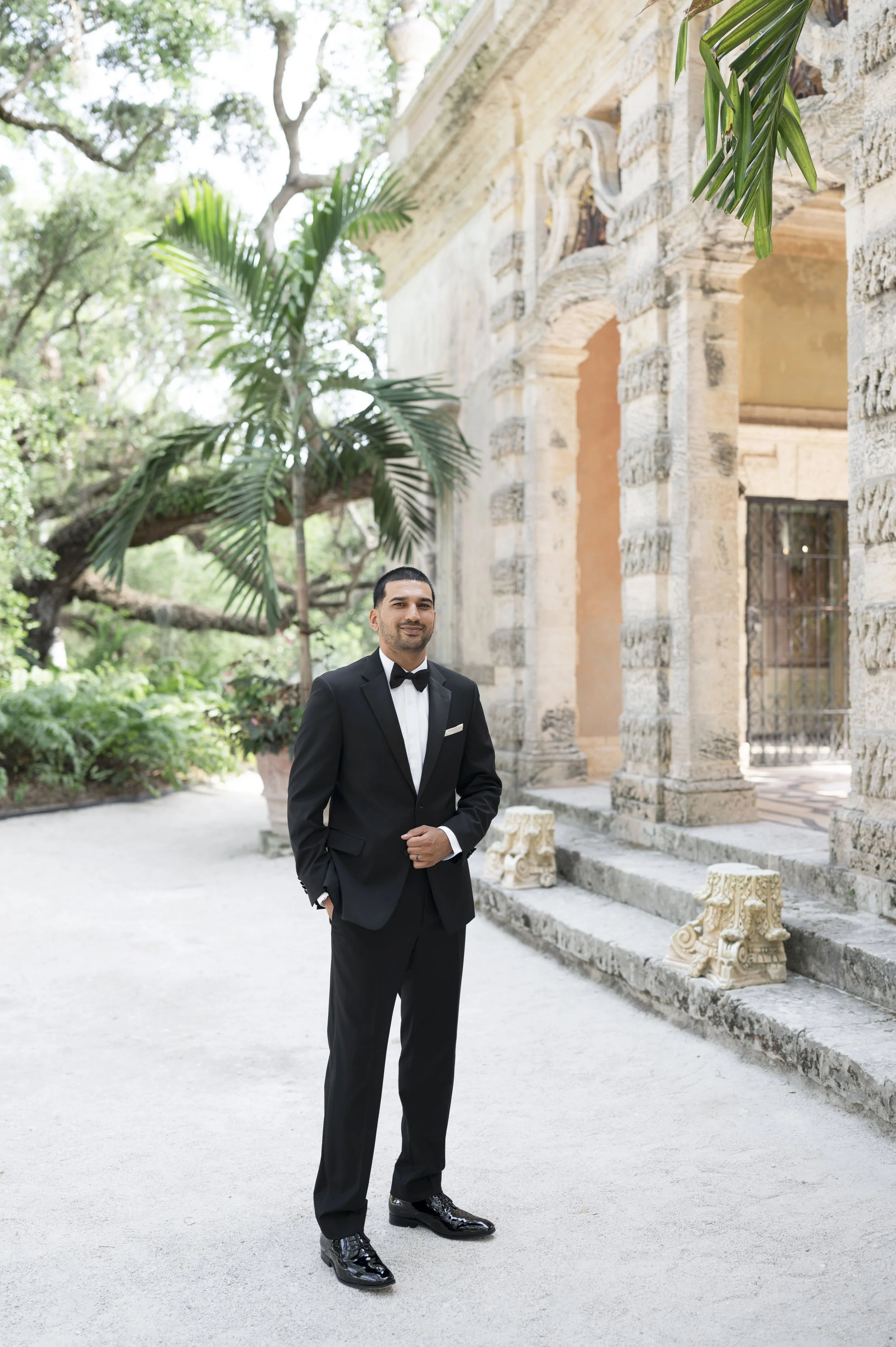 Groom standing waiting for their firs look by the mount at the Vizcaya museum