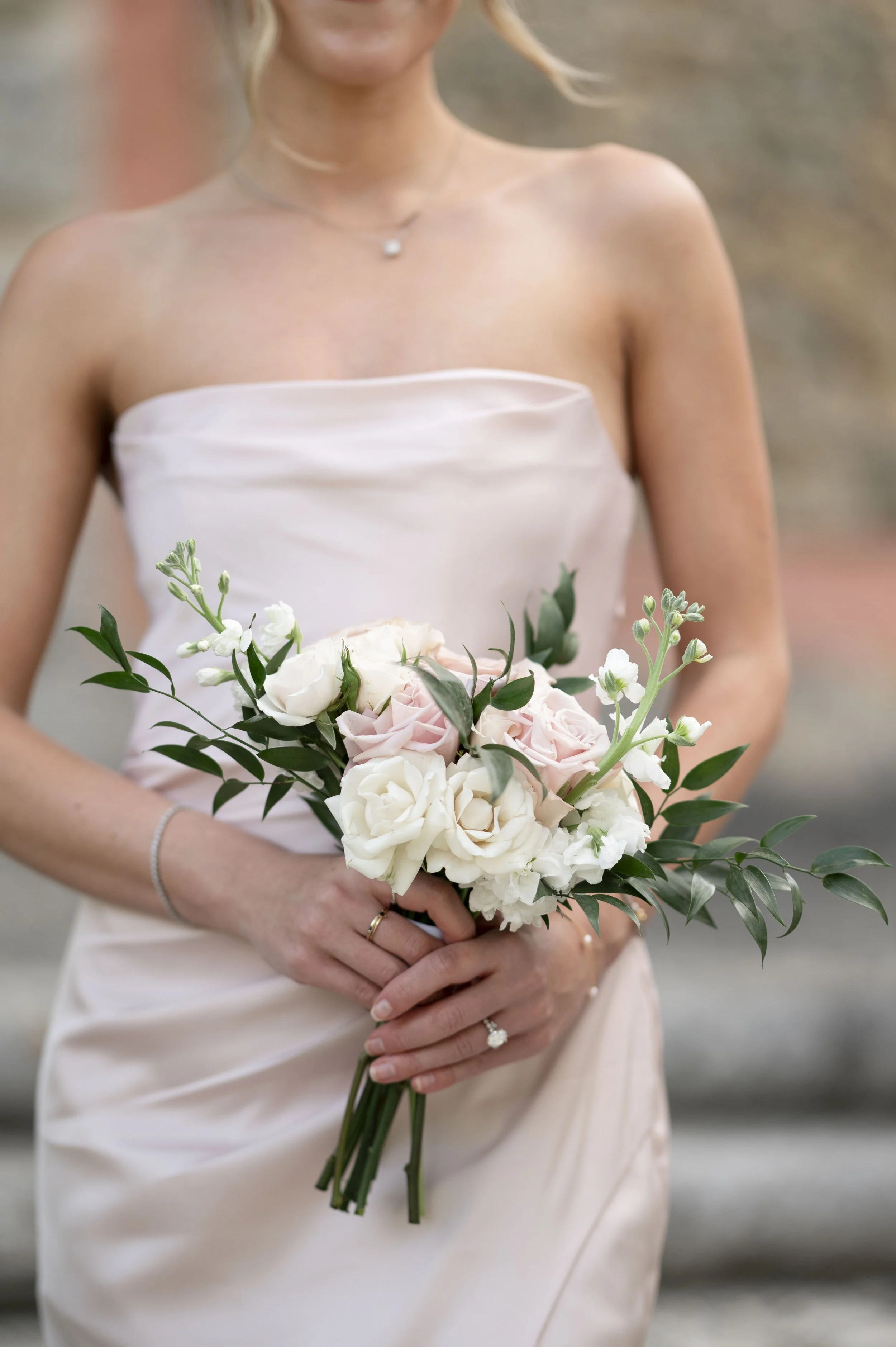 details of flowers hold by a bridesmaids