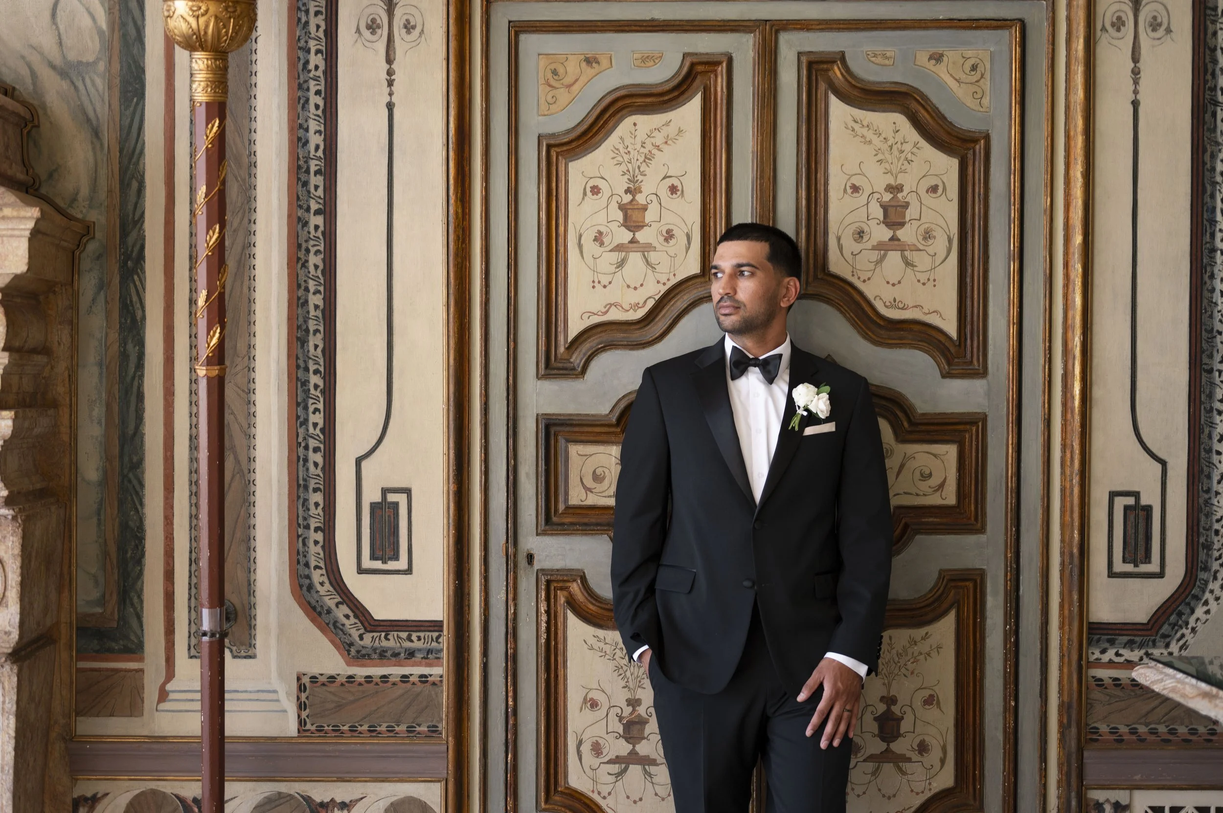 portrait of groom inside of vizcaya museum house