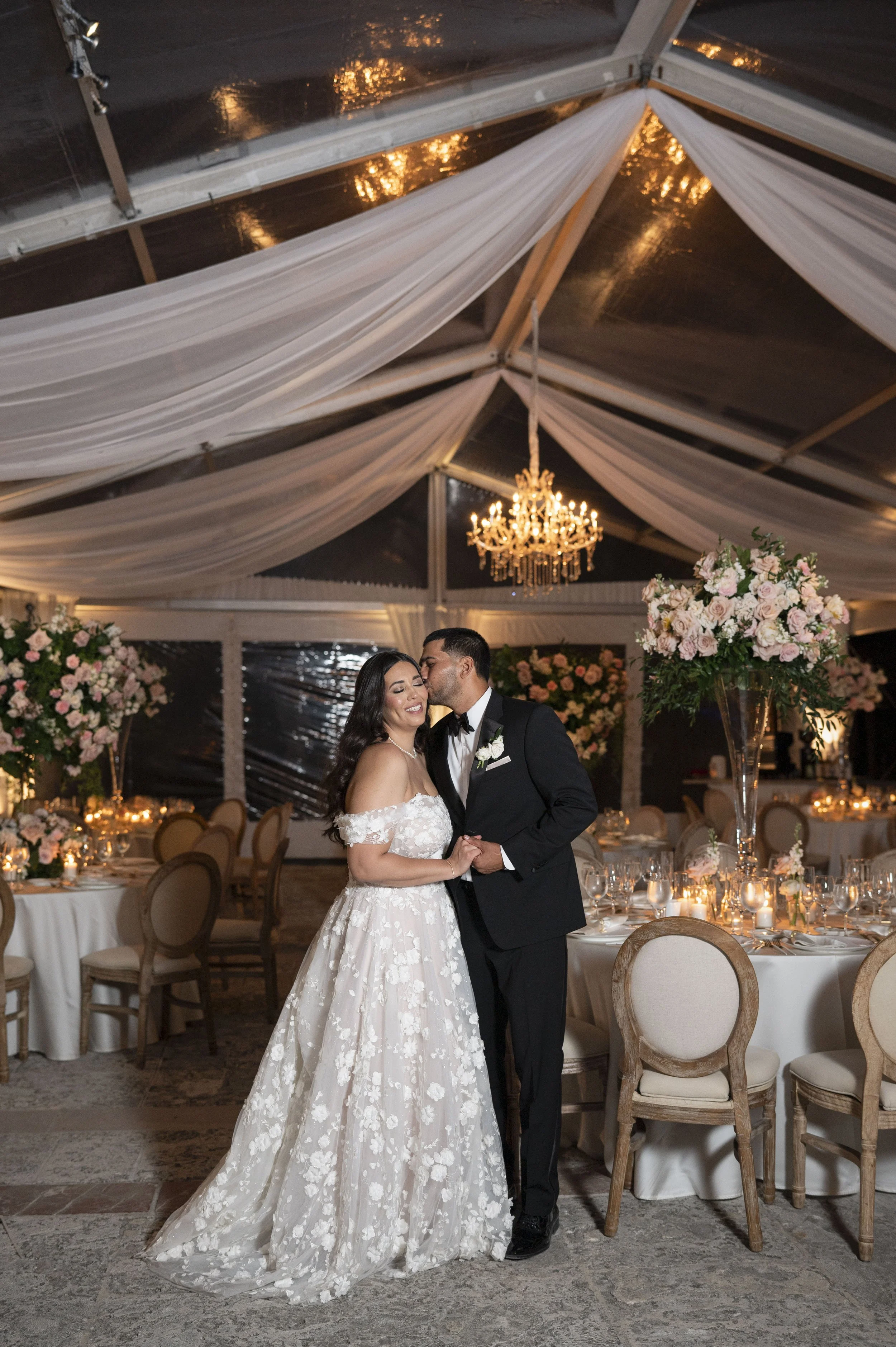 Bride and Groom Posing during their reception first look in their wedding nigh at The iconic viacaya museum miami