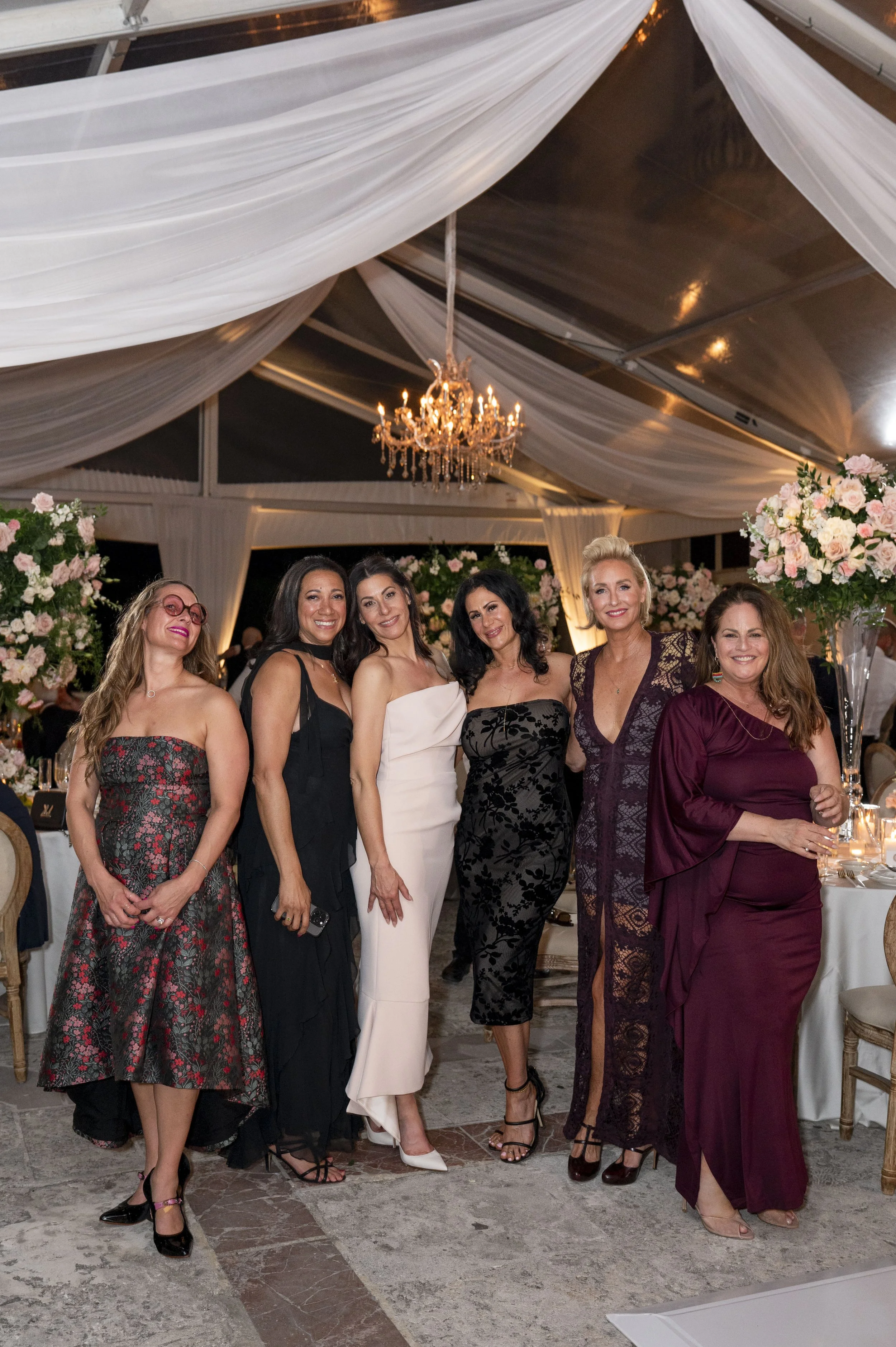 beautiful ladies standing in the wedding reception at the vizcaya museum