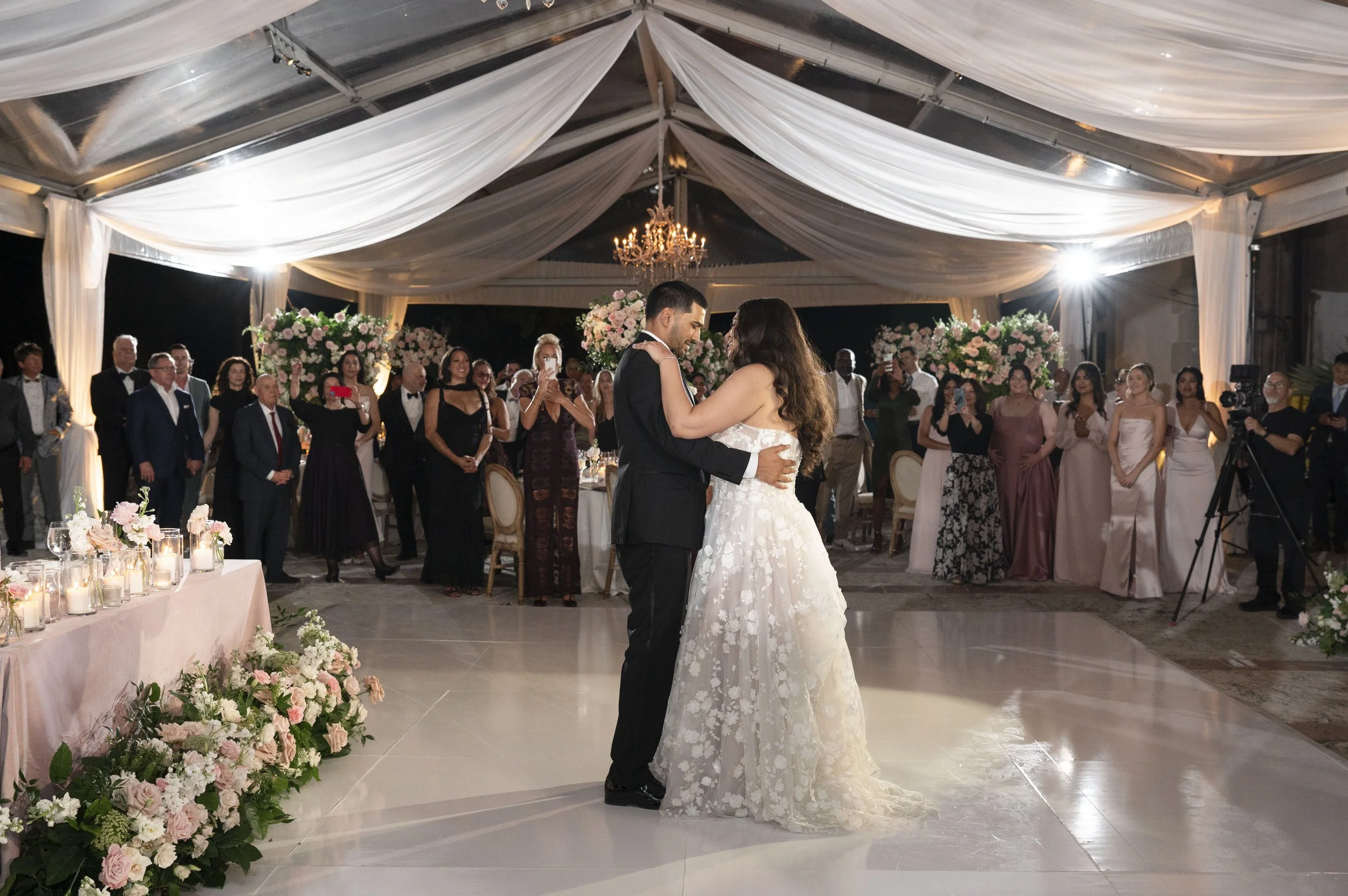 Bride and groom first dance during their reception at The Vizcaya Museum in Miami