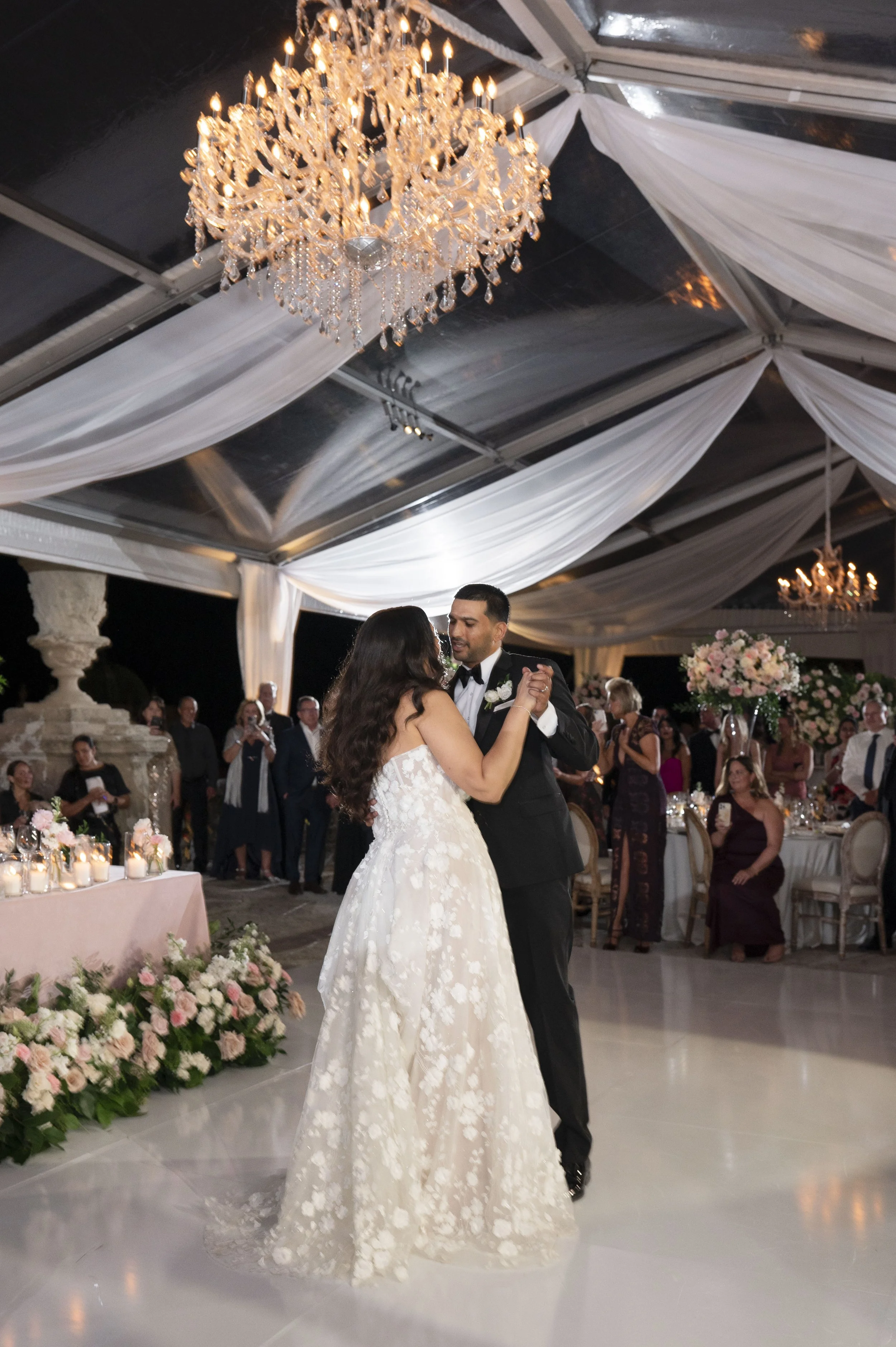 bride and groom dancing their first dance at the Vizcaya museum and gardens