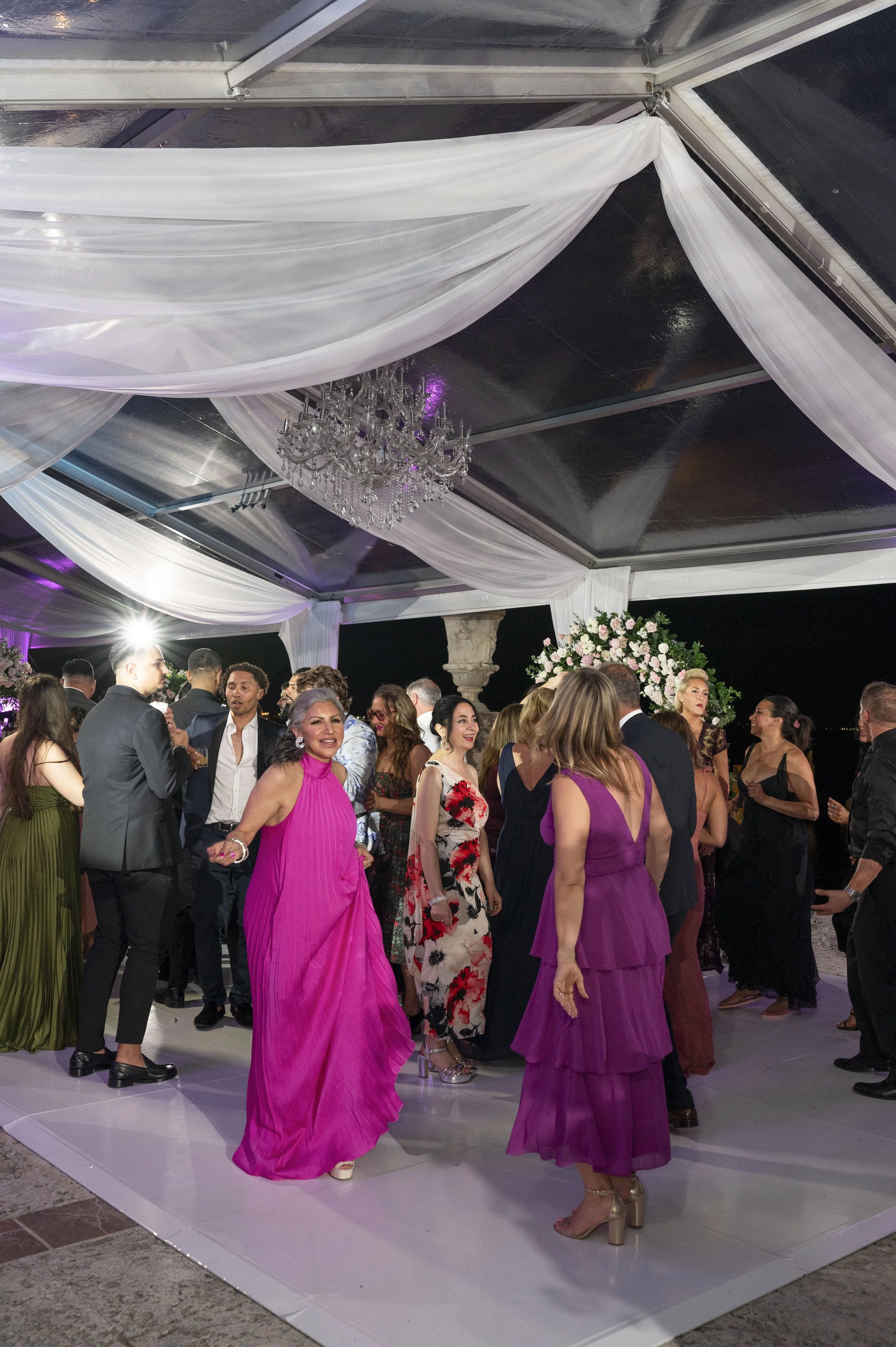 guest dancing in the reception of a wedding at the vizcaya museum