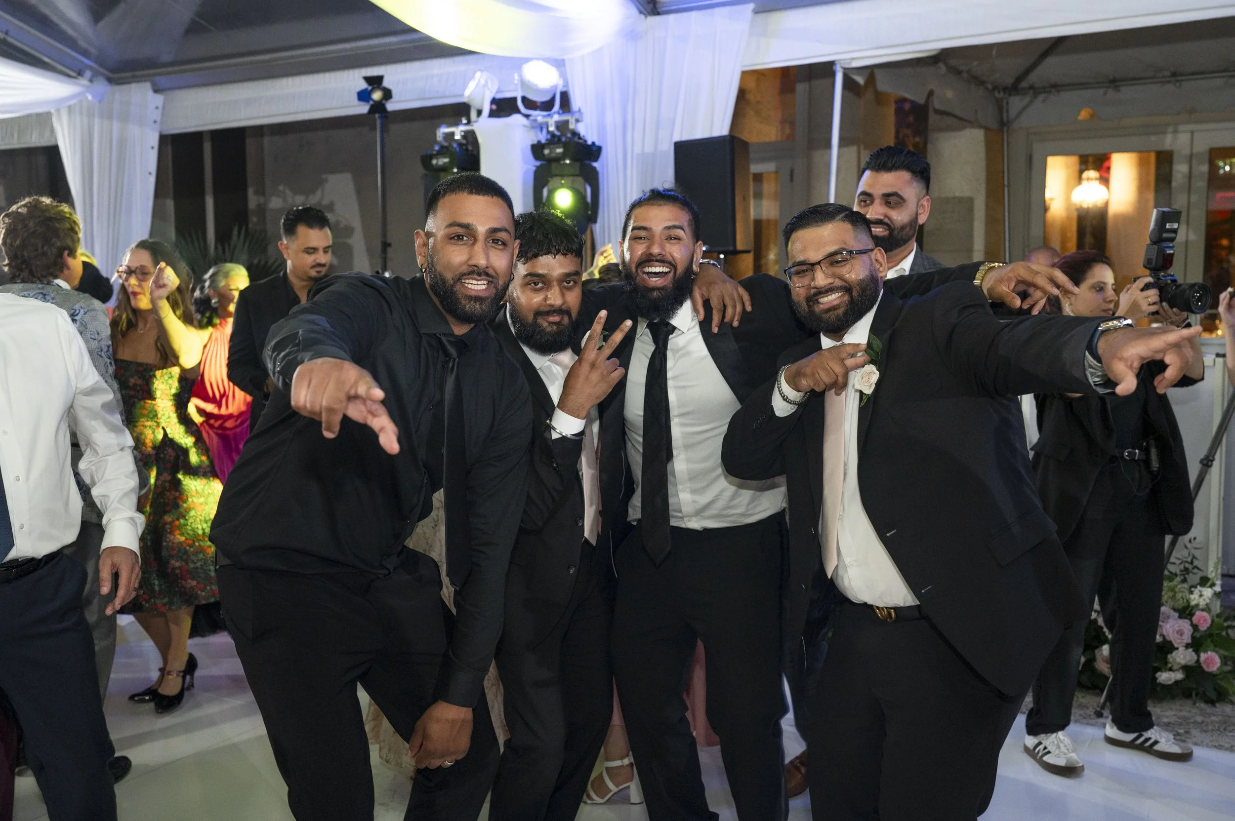 Group of guest dancing during reception at The Vizcaya museum wedding in Iconic Miami