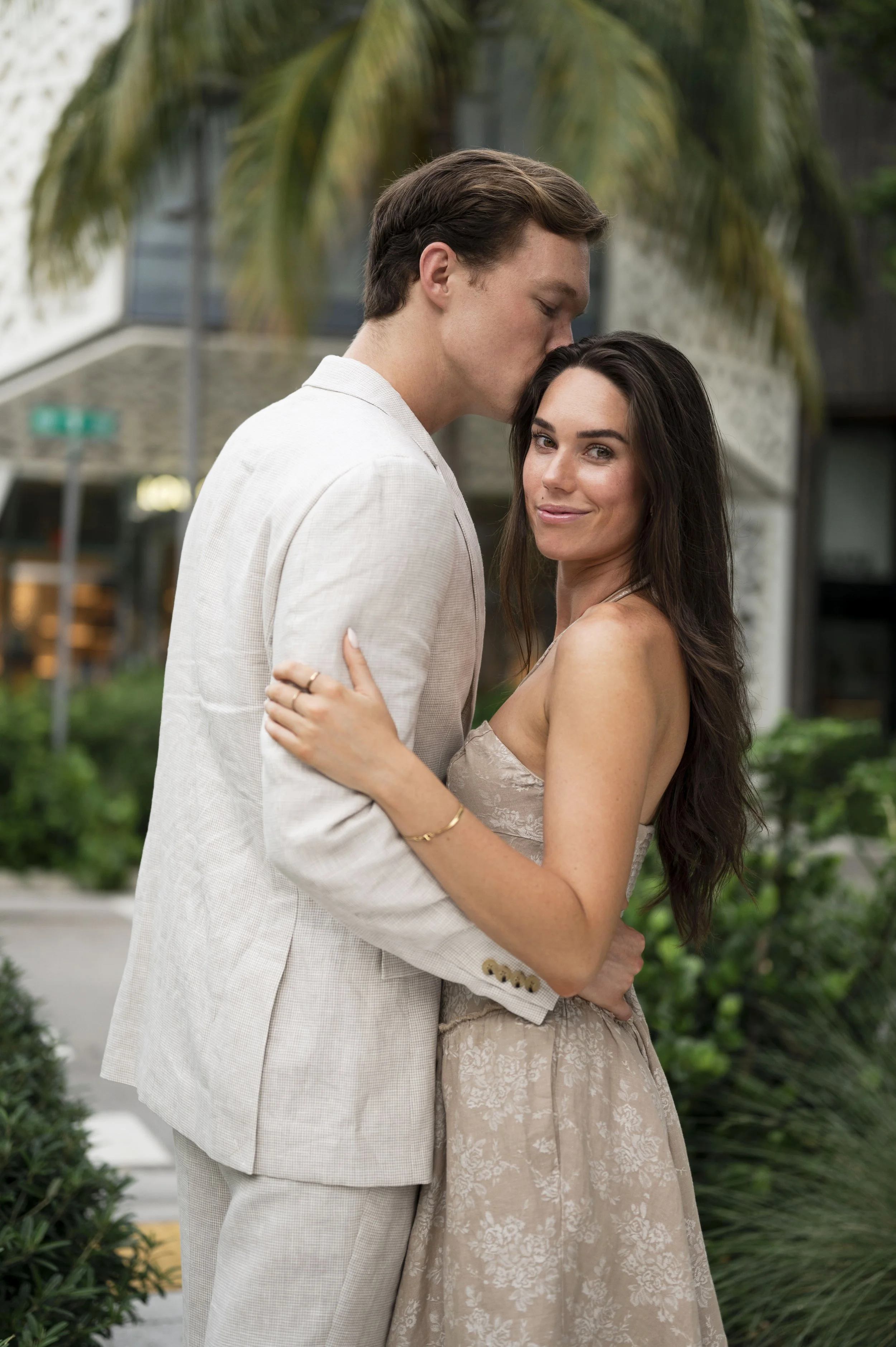 Travis and Rachel hold each other during their session at the miami design district