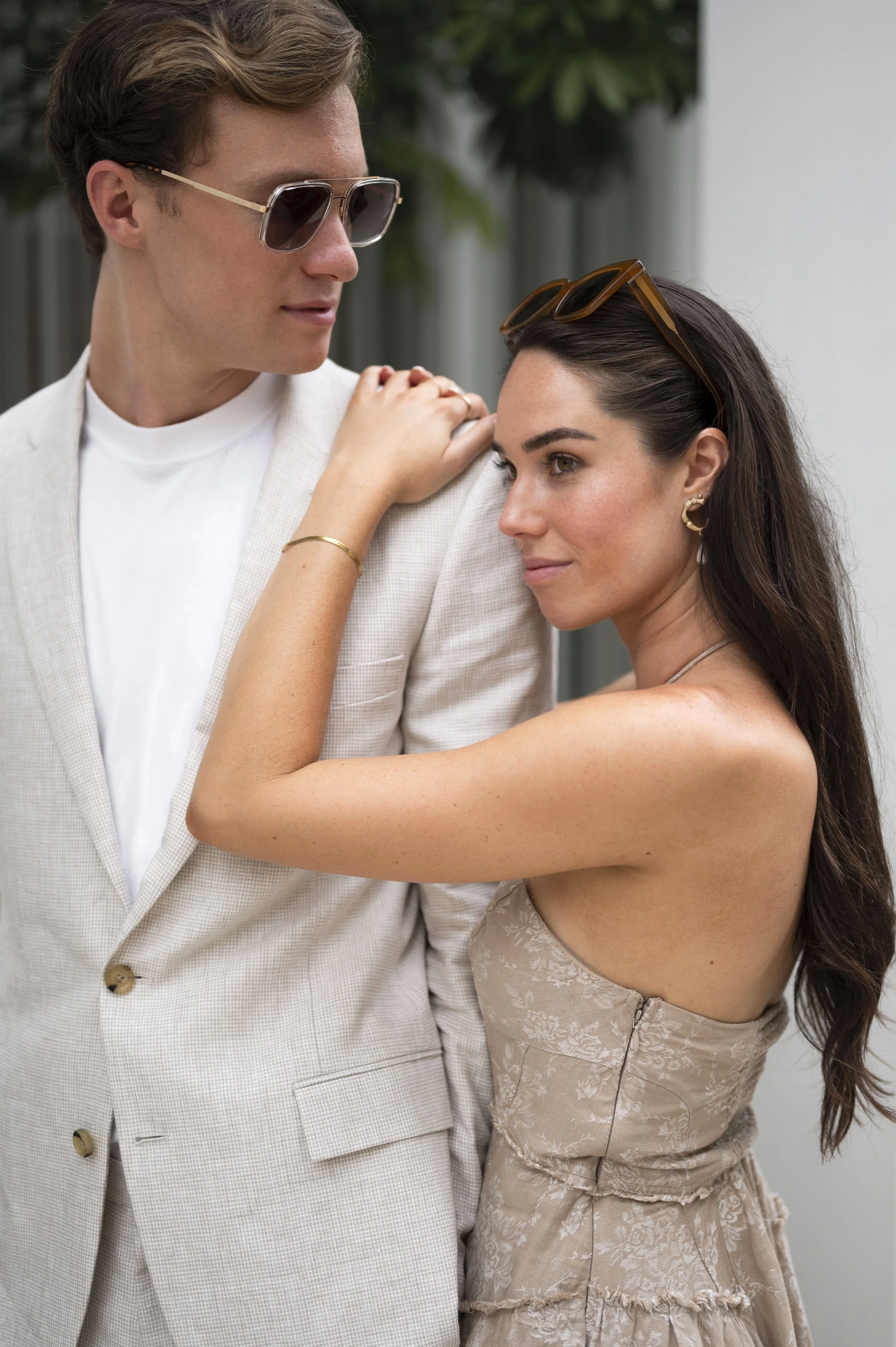 rachel leans on travis in miami design district during their engagement session
