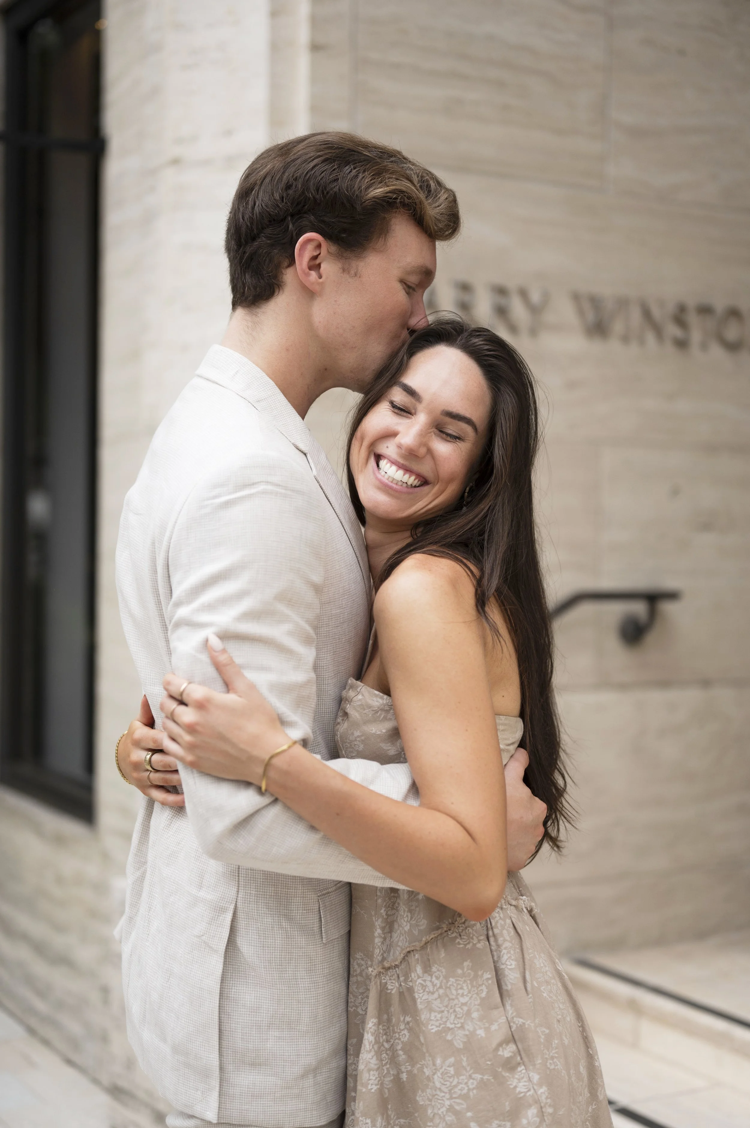 Travis and Rachel Kissing during their engagement session at design district miami