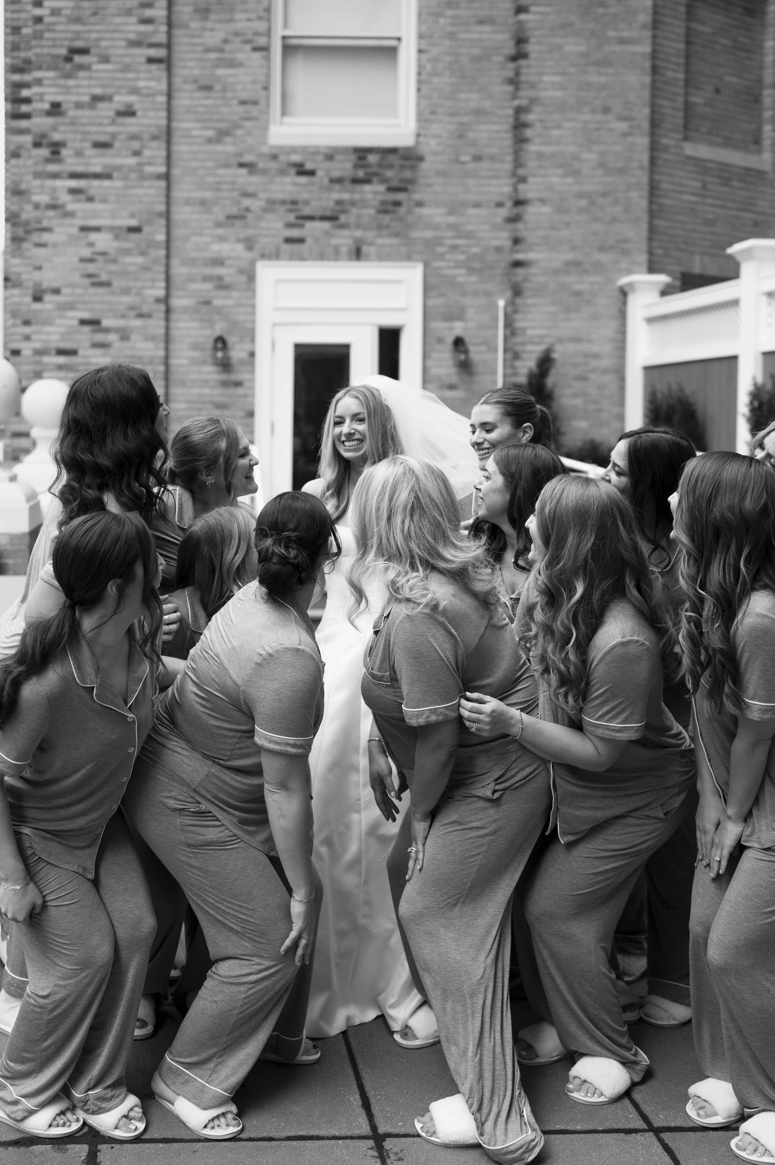 bride's first look with her brides ourdoor in a terrace of the hilton park plaza