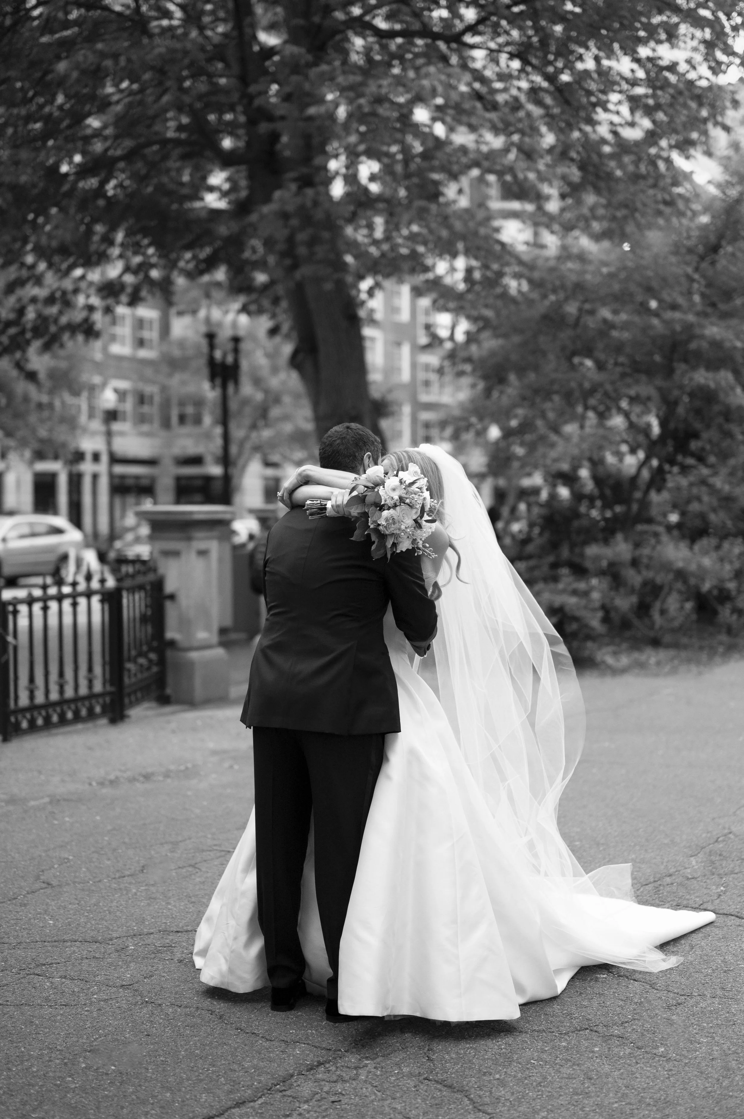 bride huggs groom as they see each other for the first time