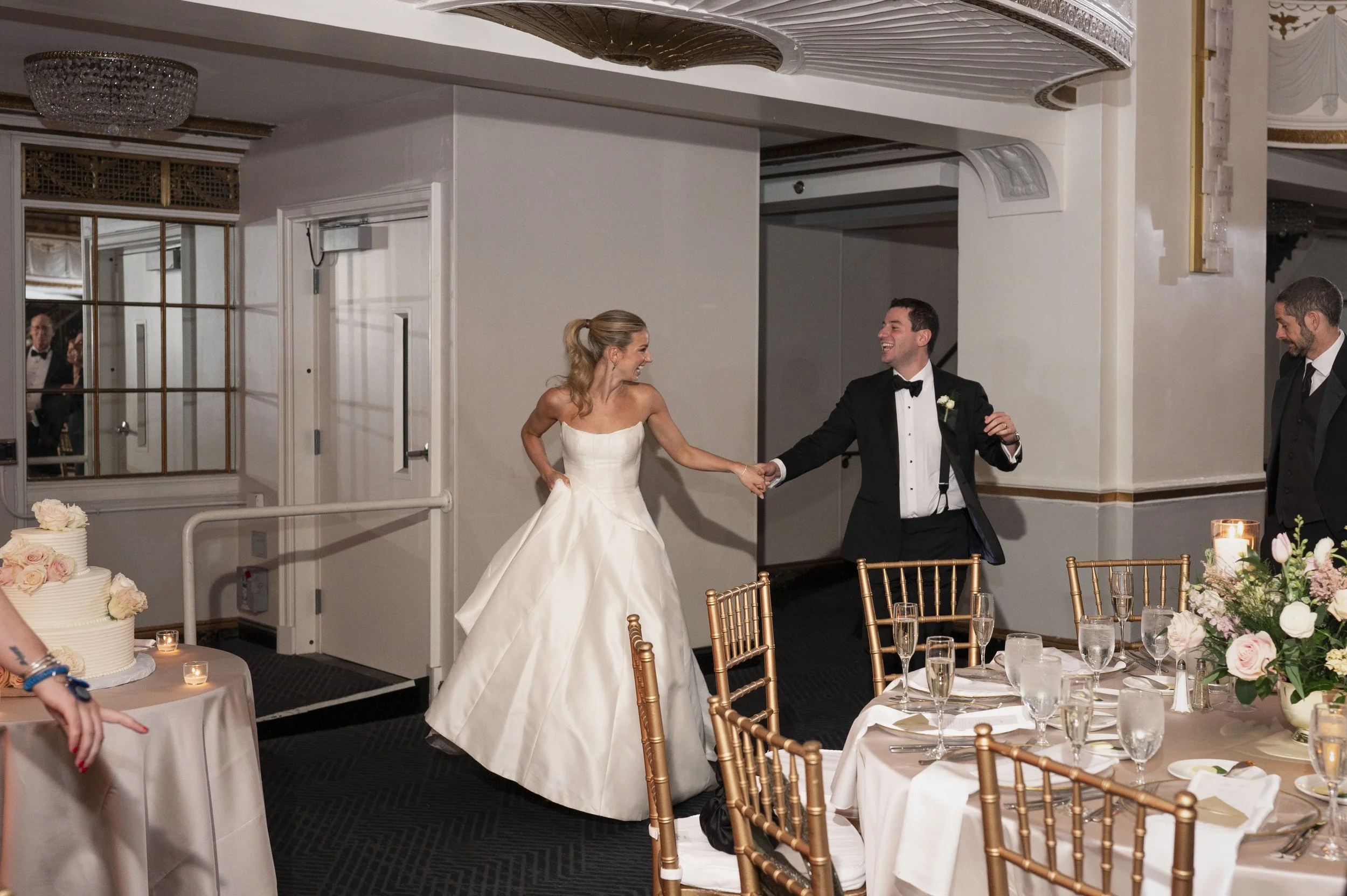 bride and groom enter their ballroom dancing