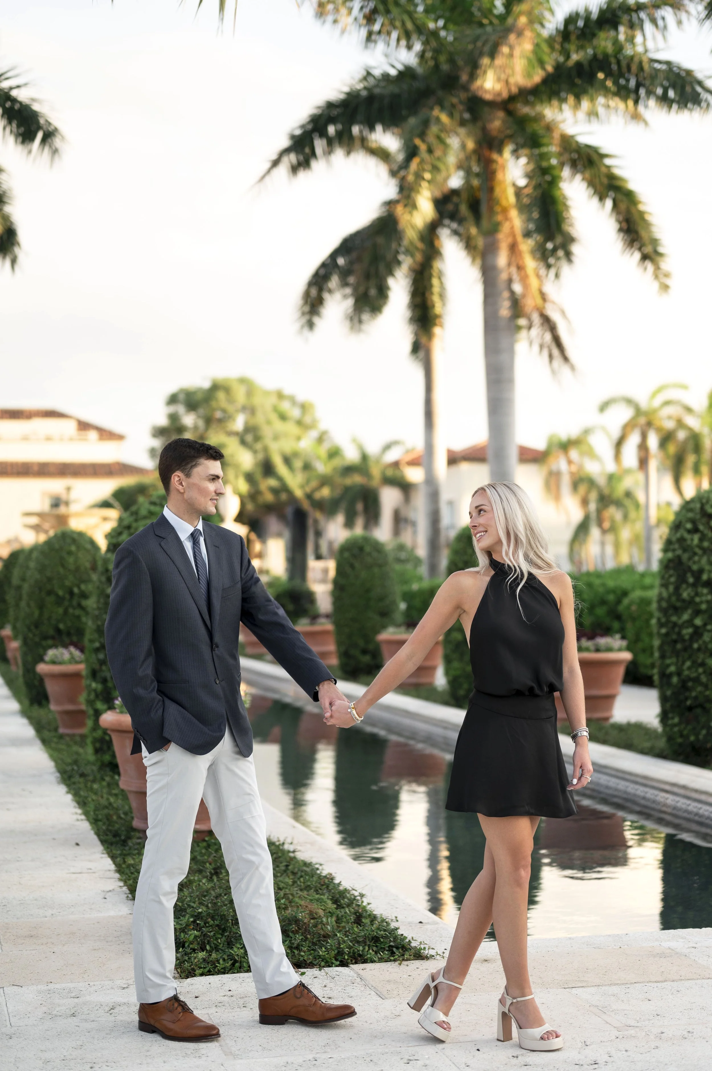 Engaged couple walking through Palm Beach after their surprise proposal (Copy)