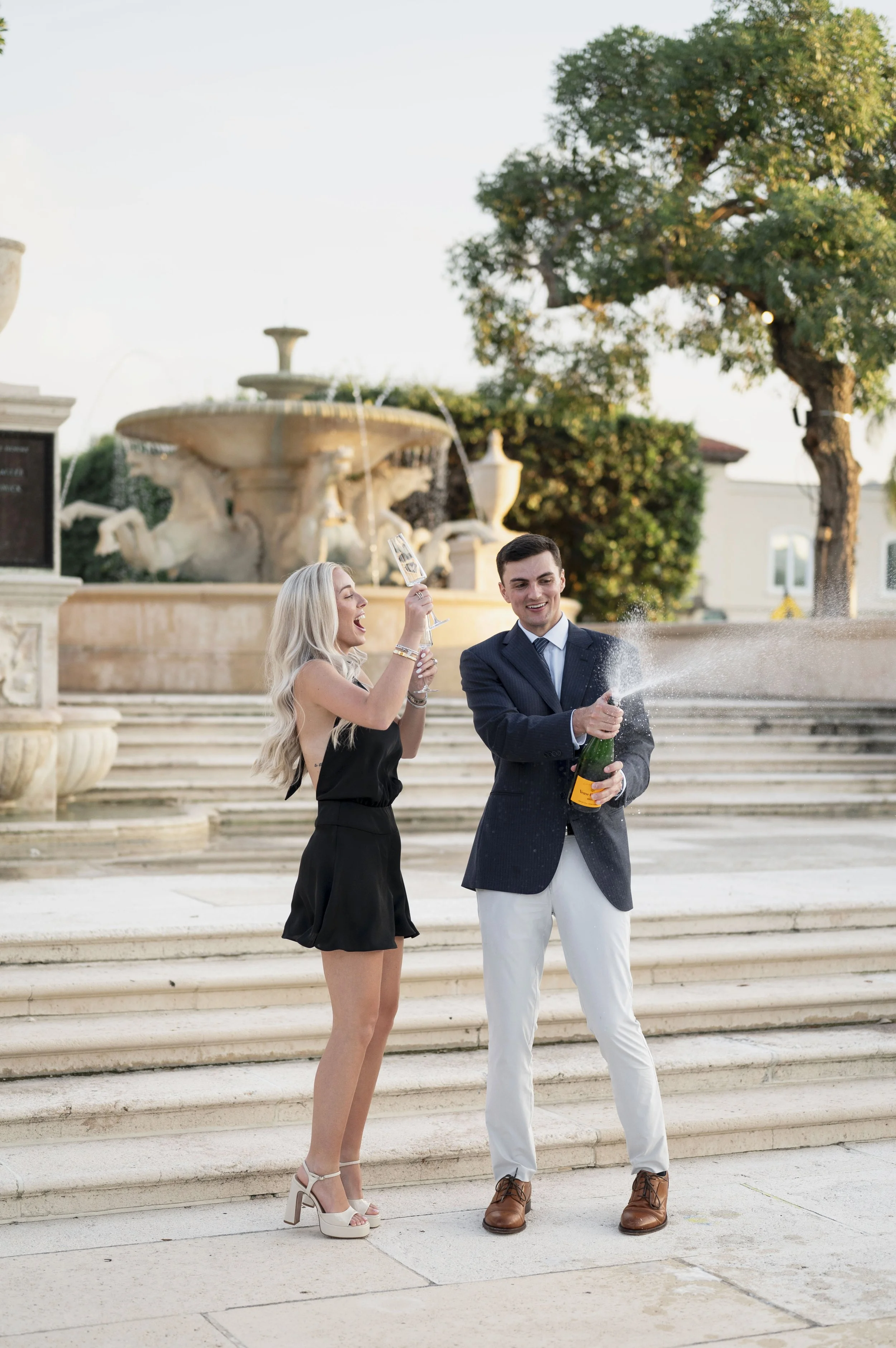 Michael and Mattie celebrating their engagement with champange in Palm Beach (Copy)