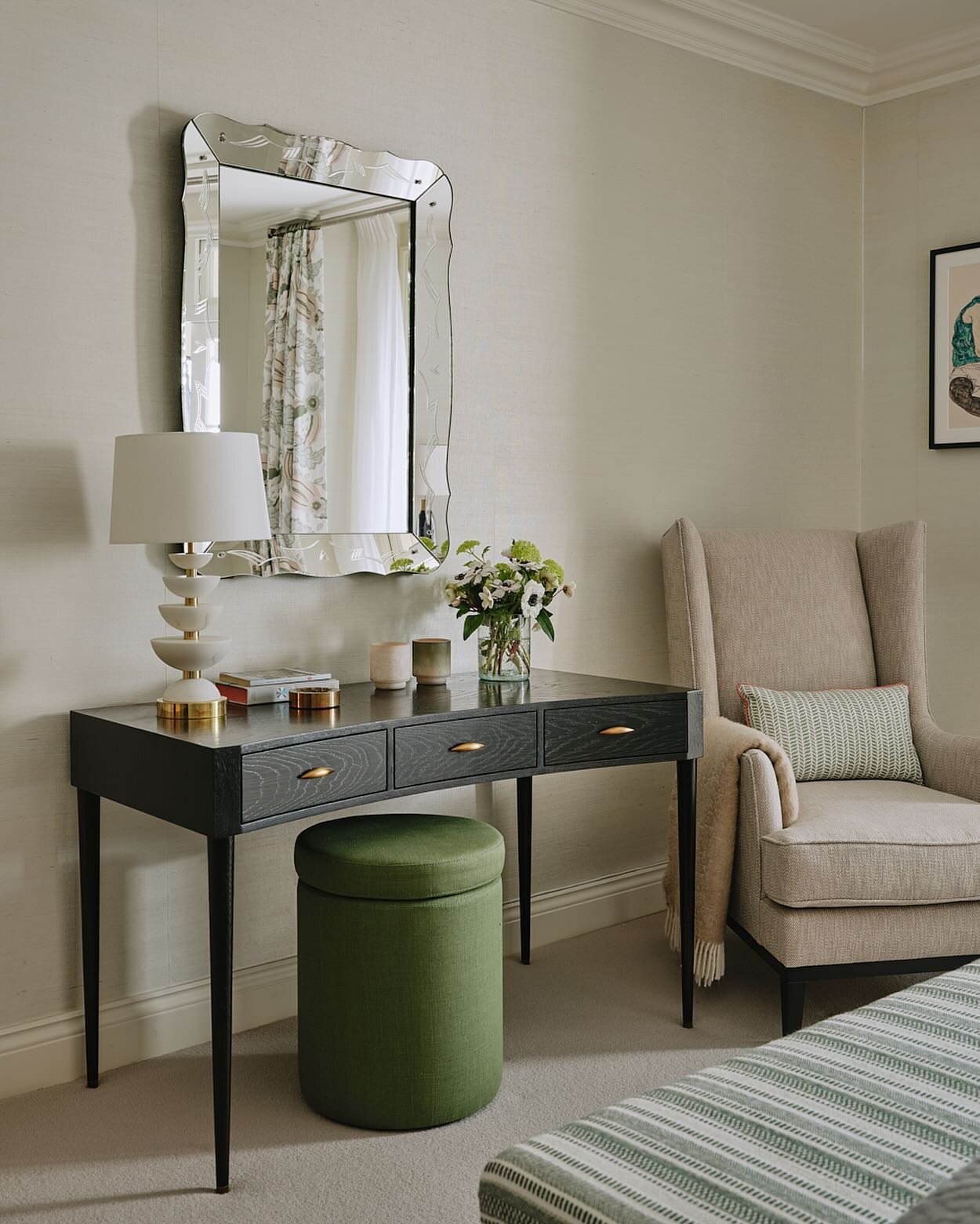 Mirror mirror on the wall. Pearlescent grasscloth on the walls and a 1940s Venetian style mirror helped prevent this lower ground level bedroom from feeling too gloomy. 📸 @horwoodphoto #interiordesign #recentproject #bedroomdecor #howwedwell #london