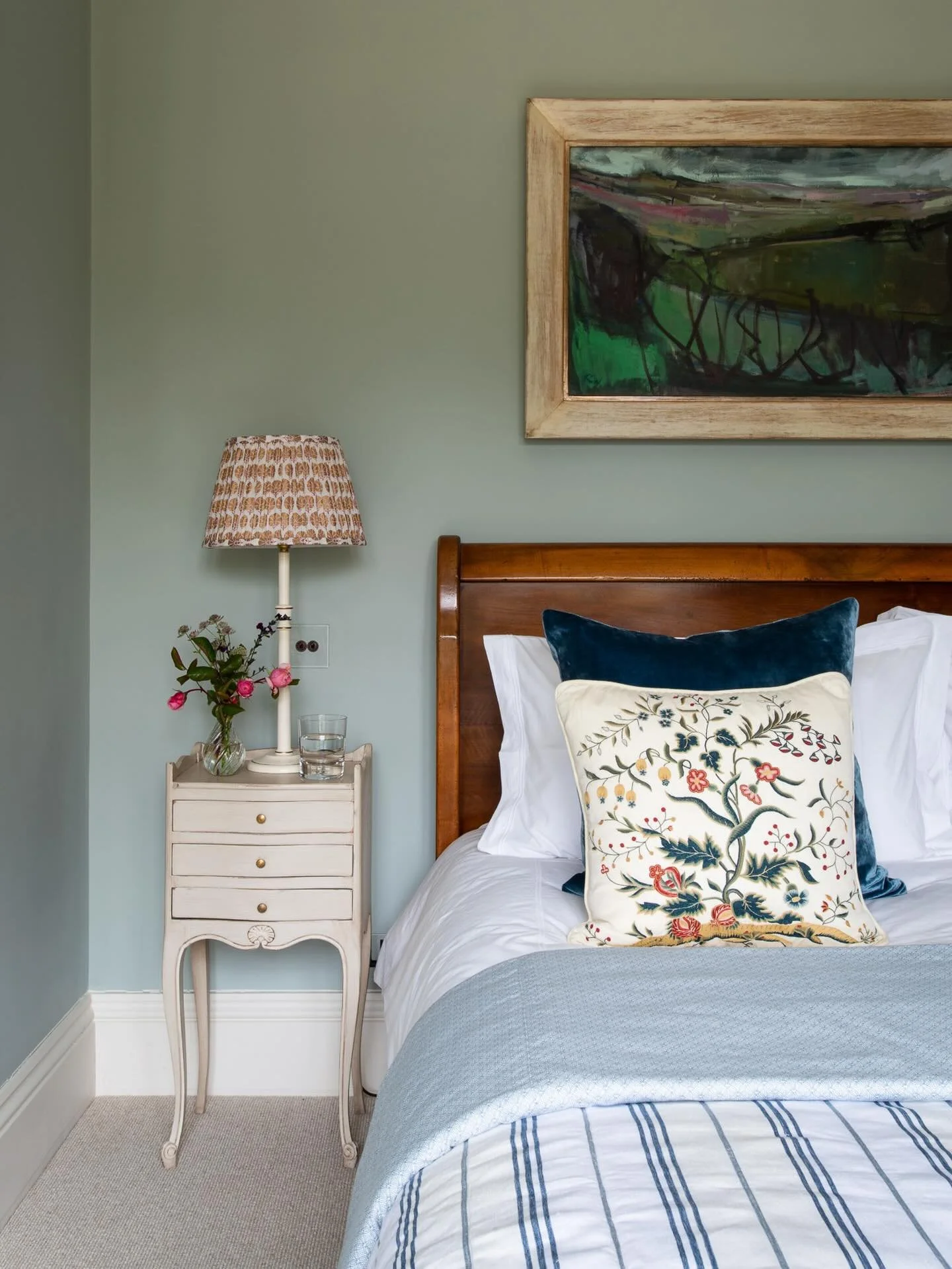 Moody blue.  Pale blue walls give an air of tranquility and set off a moody landscape over the walnut sleigh bed in this country house project. 📸 @marknicholson.photographer #interiordesign #bedroomdecor #countryhousestyle #bedroomdesign #interiorsa