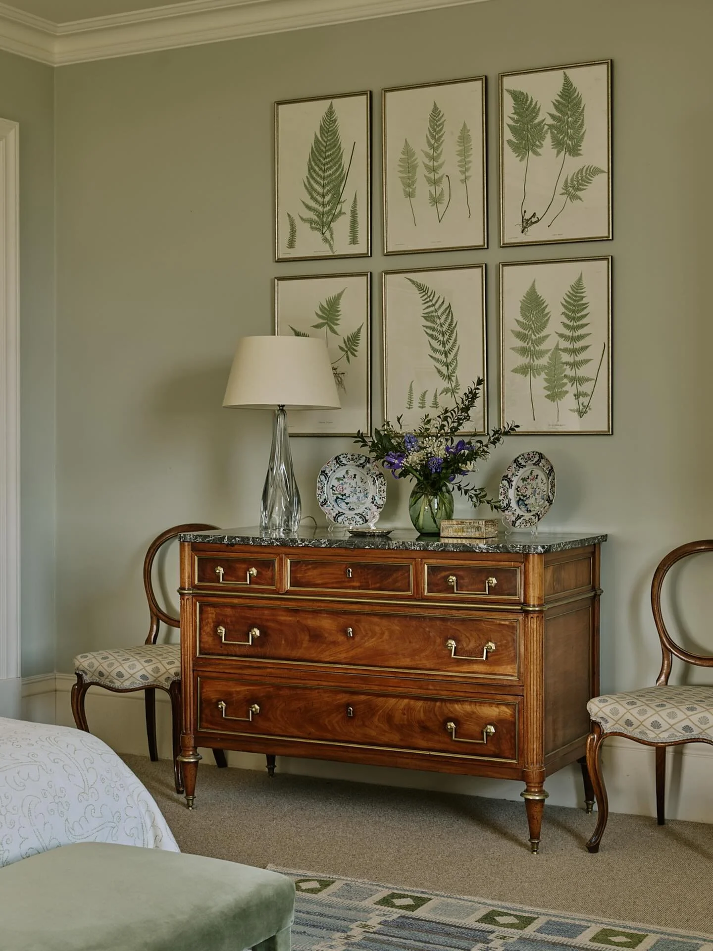Leafy greens in the master bedroom of our Oxfordshire manor house project. #bedroomdecor #interiordesign #bedroominspiration #thecotswolds #howwedwell