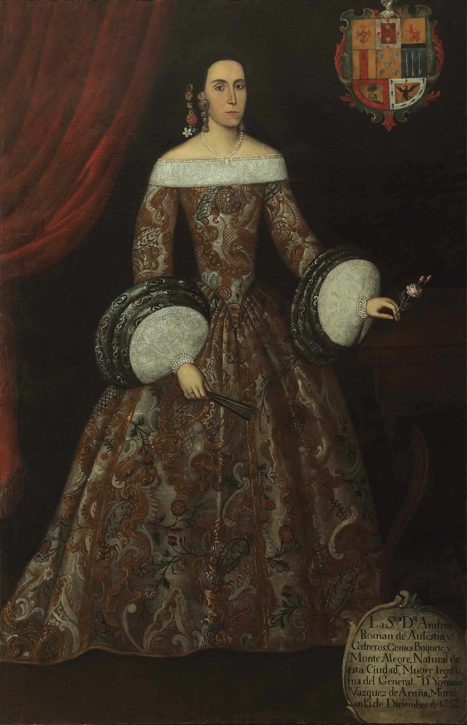 Woman poses in a dark background. Red curtain on left.  Viceregal coat of arms right.