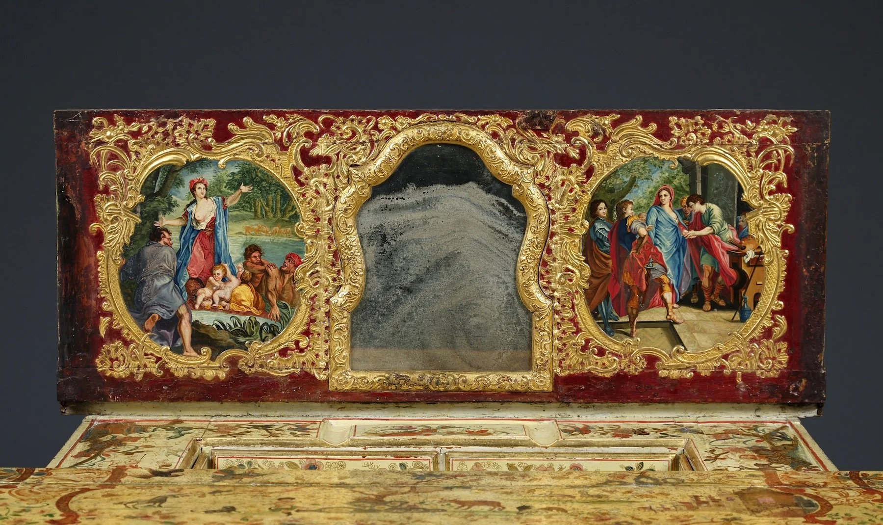 Painted interior of the present table depicting classical subjects