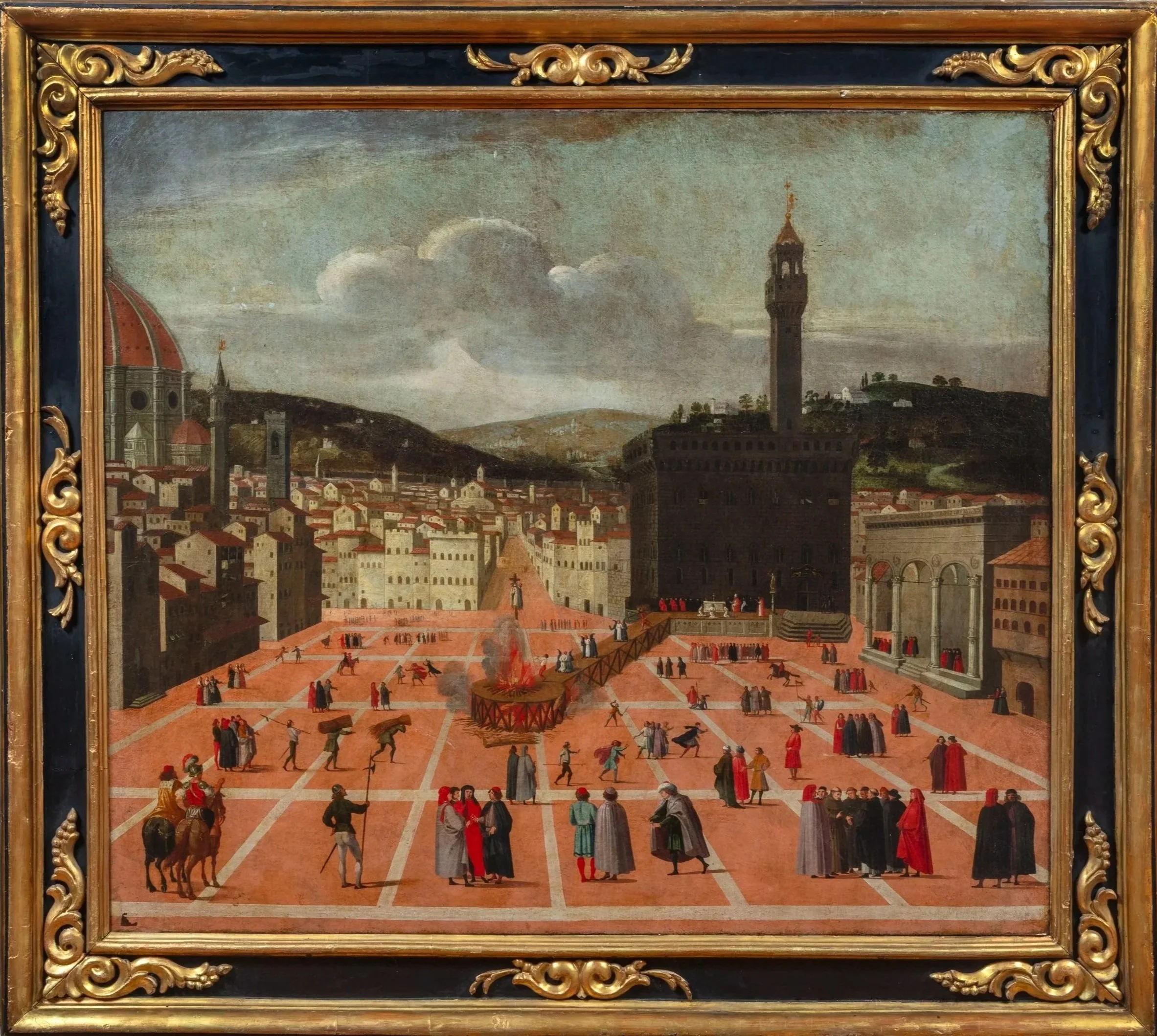 View of Florence's Piazza della Signoria with figures gathering around a burning fire